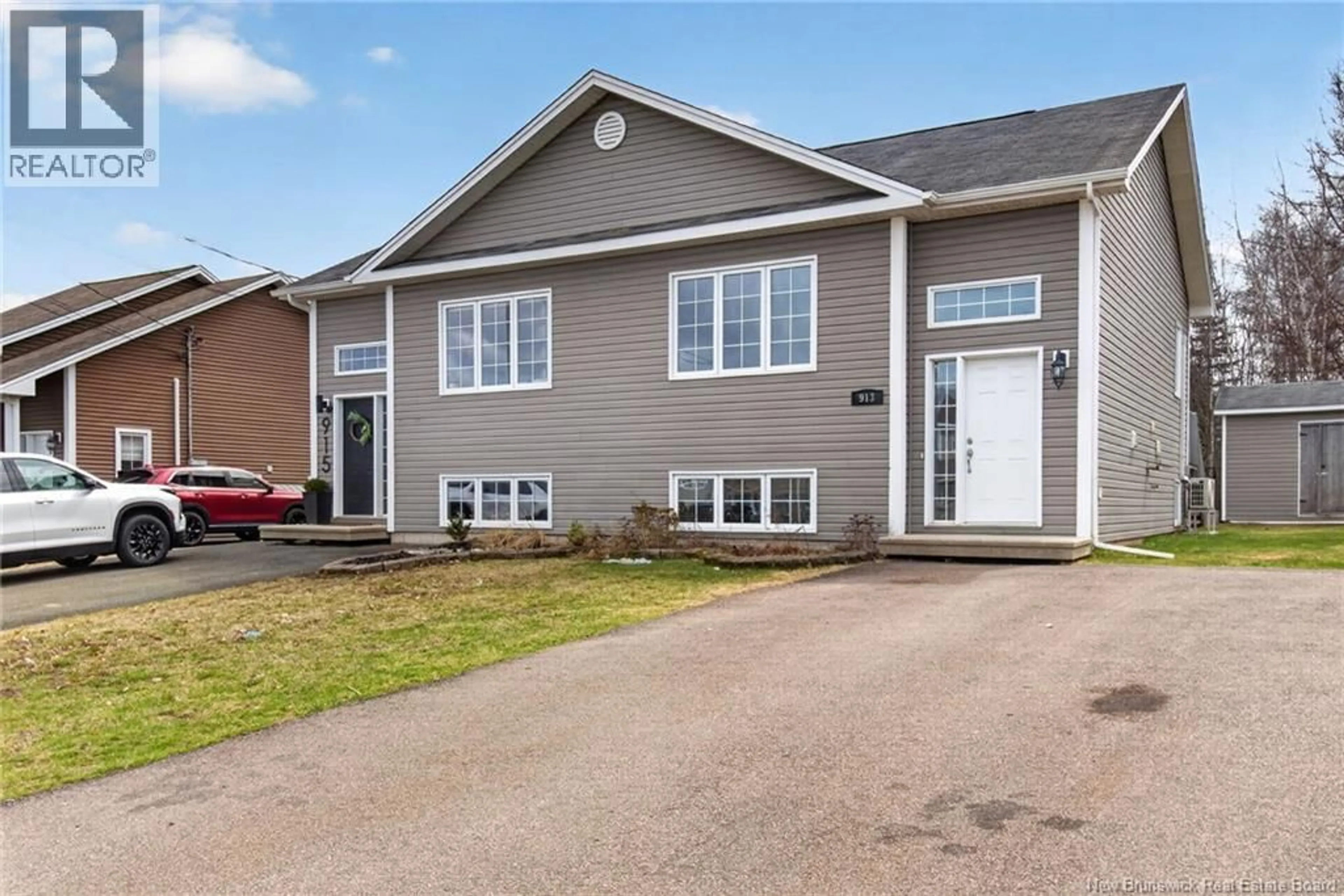 Home with vinyl exterior material, street for 913 BERNARD, Dieppe New Brunswick E1A4A6