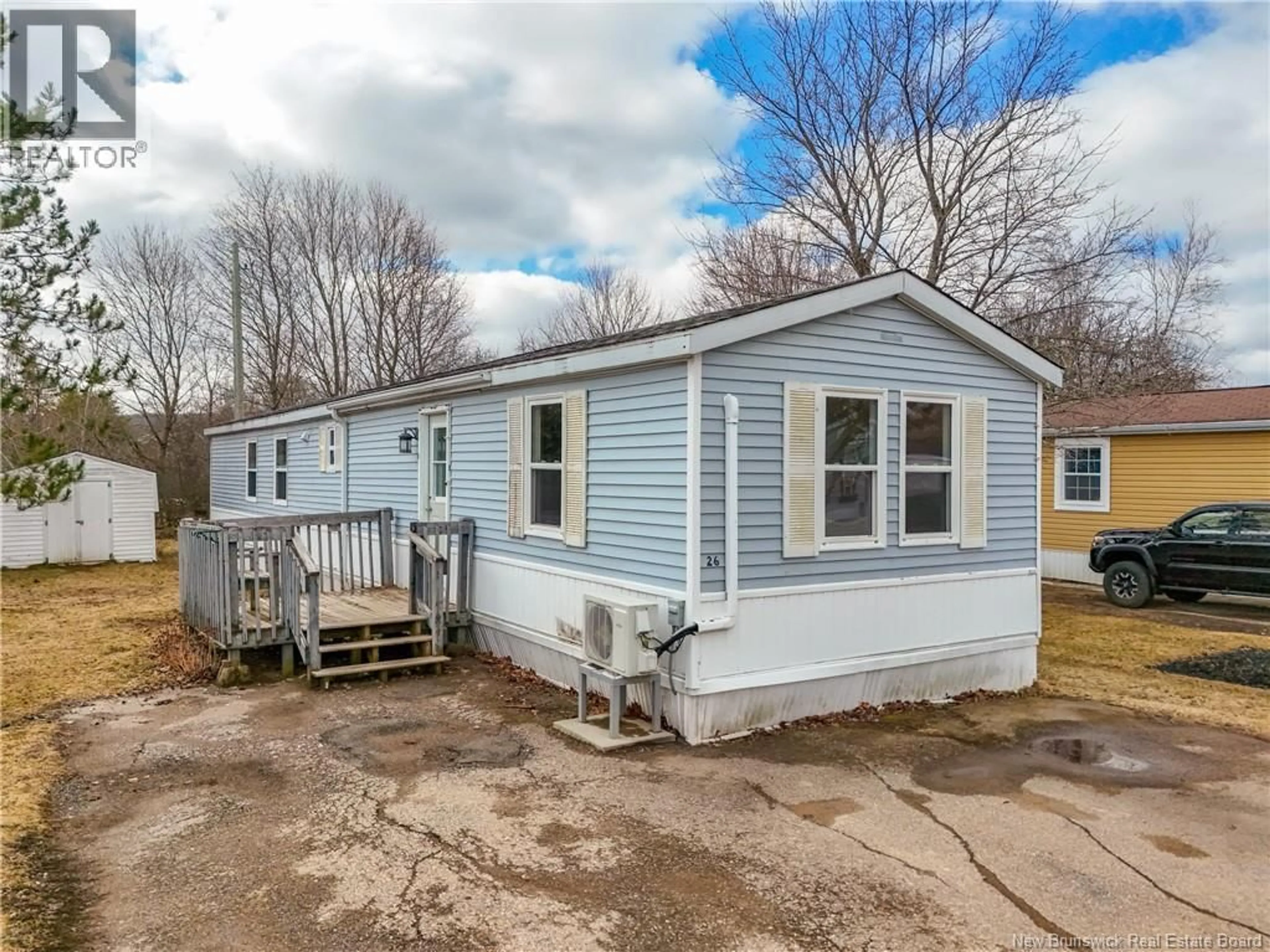 Home with vinyl exterior material, street for 26 FIRST STREET, Sussex Corner New Brunswick E4E2W1