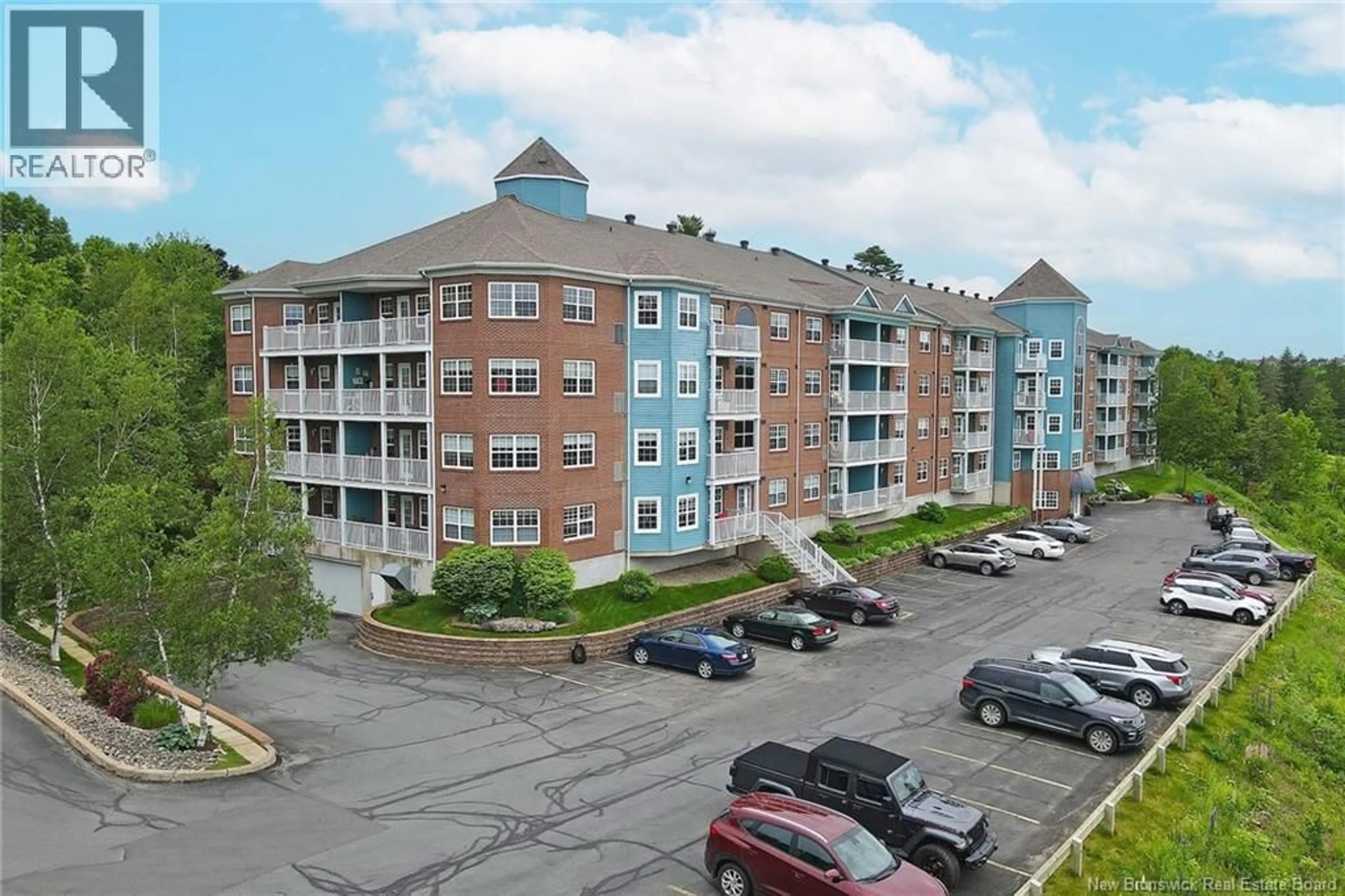 A pic from outside/outdoor area/front of a property/back of a property/a pic from drone, unknown for 409 - 1 GOLF GREENS LANE, Fredericton New Brunswick E3B9T9