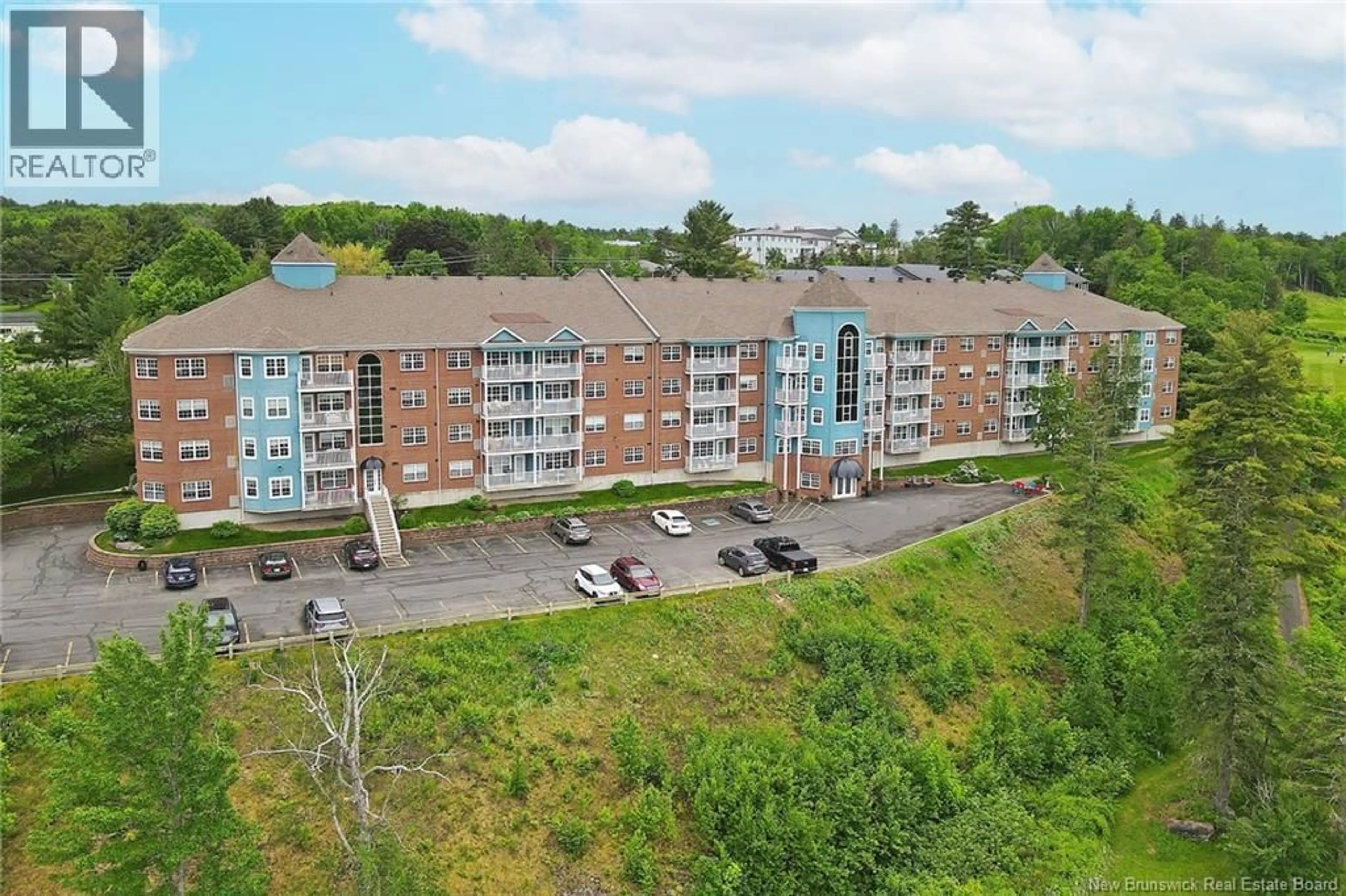 A pic from outside/outdoor area/front of a property/back of a property/a pic from drone, building for 409 - 1 GOLF GREENS LANE, Fredericton New Brunswick E3B9T9