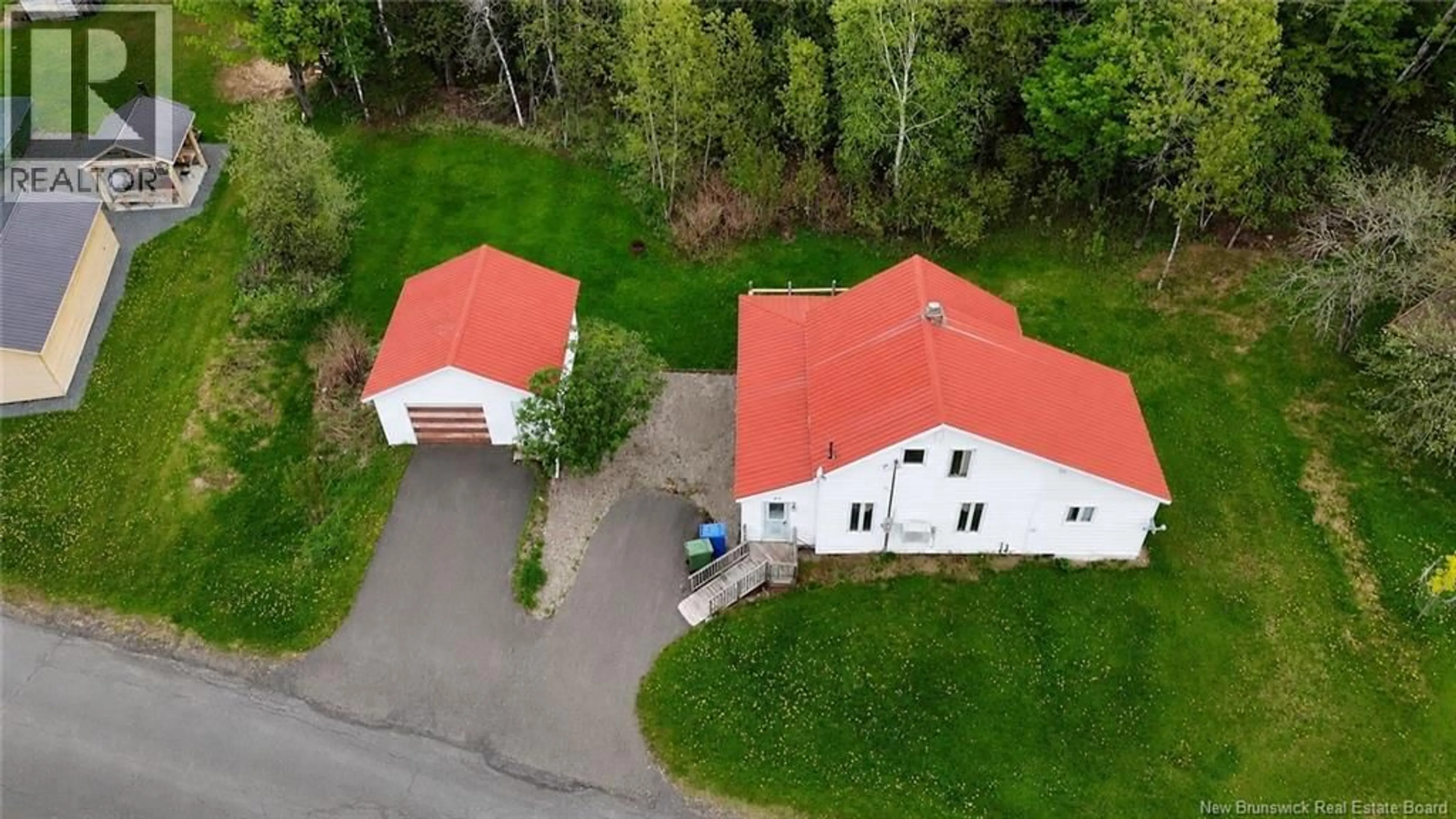 A pic from outside/outdoor area/front of a property/back of a property/a pic from drone, building for 20 ROULSTON AVENUE, Plaster Rock New Brunswick E7G2R2