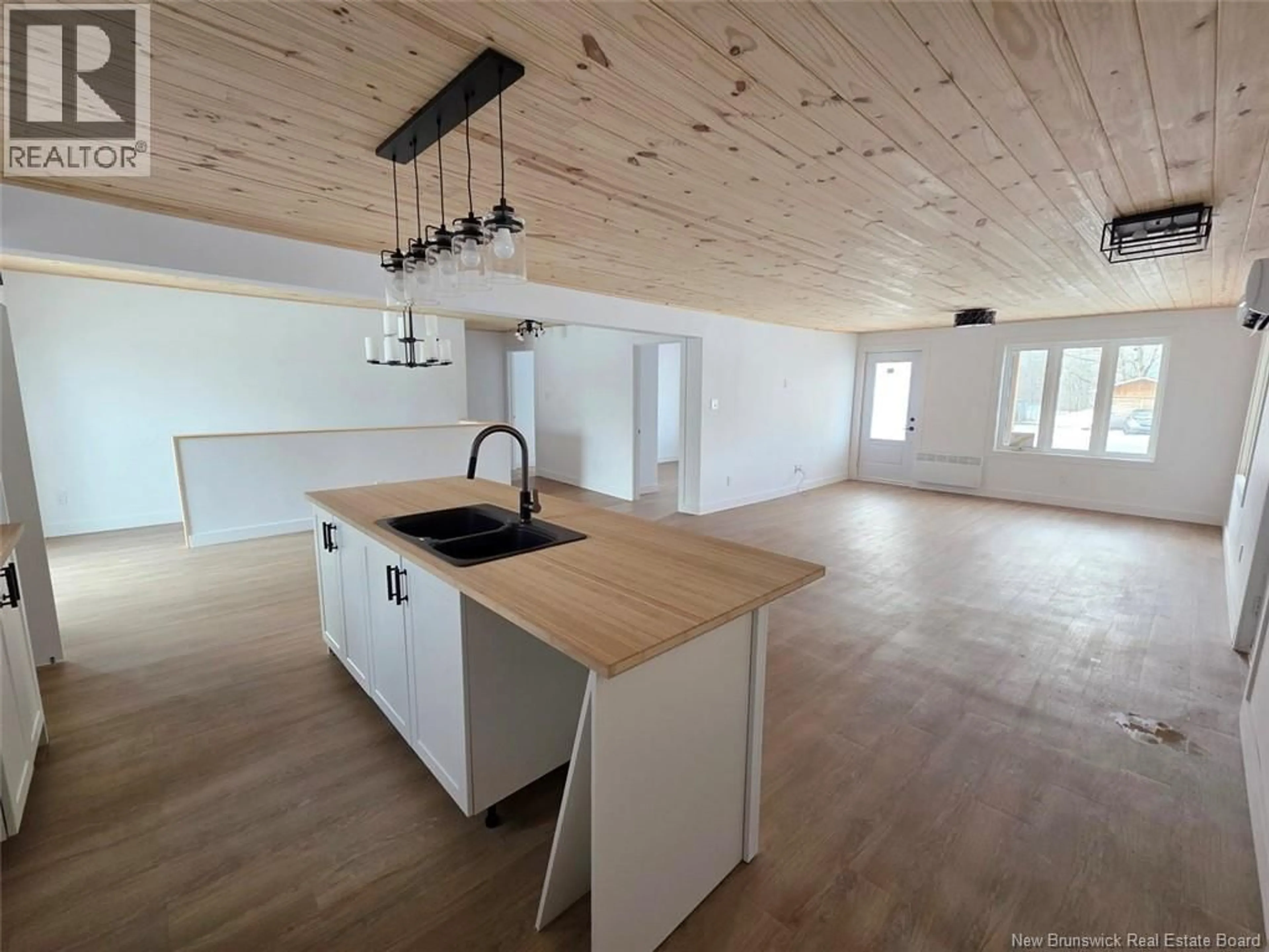 Open concept kitchen, wood/laminate floor for 195 PRINCIPALE STREET, Sainte-Anne-De-Madawaska New Brunswick E7E1B8