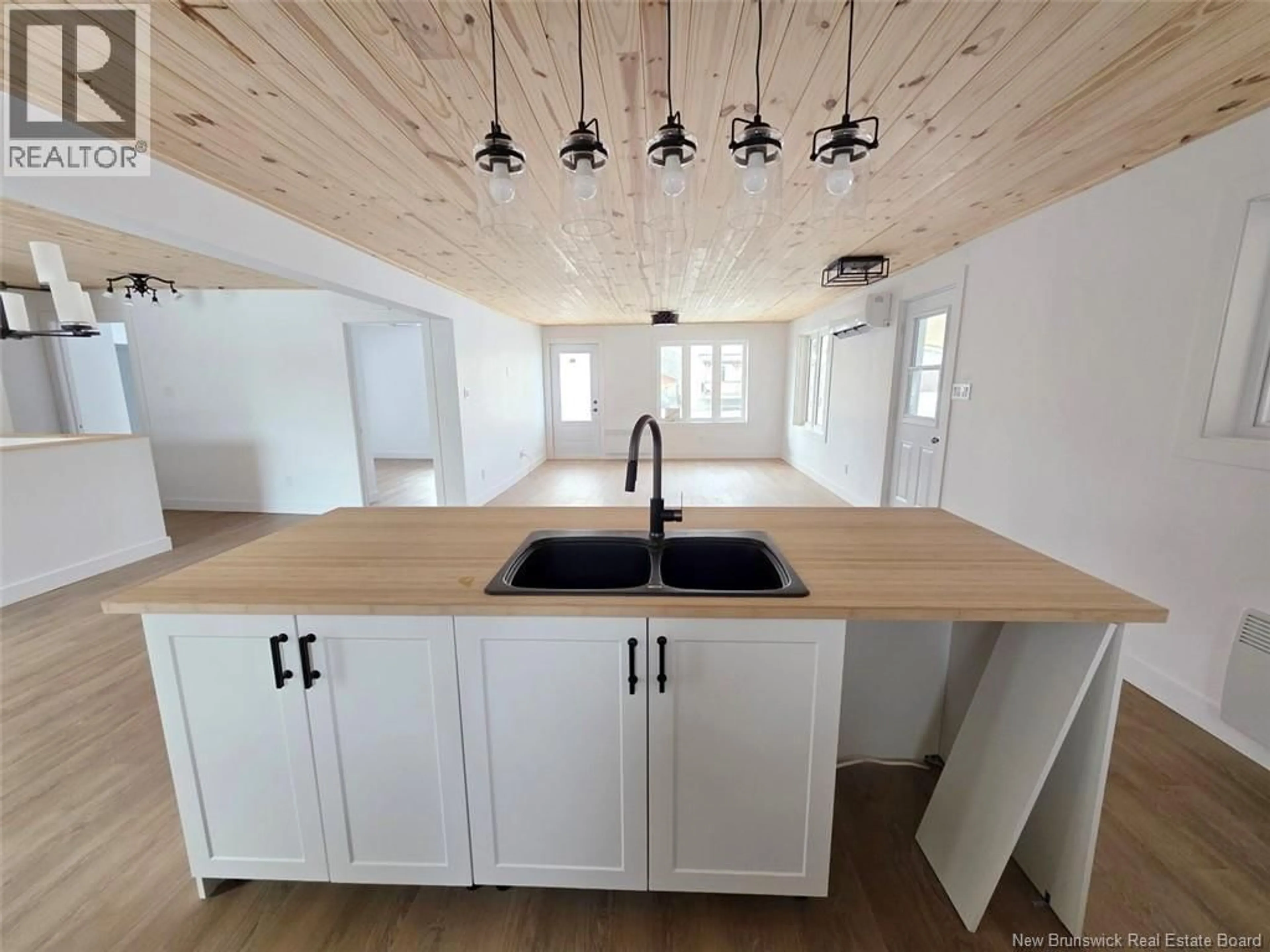 Open concept kitchen, wood/laminate floor for 195 PRINCIPALE STREET, Sainte-Anne-De-Madawaska New Brunswick E7E1B8