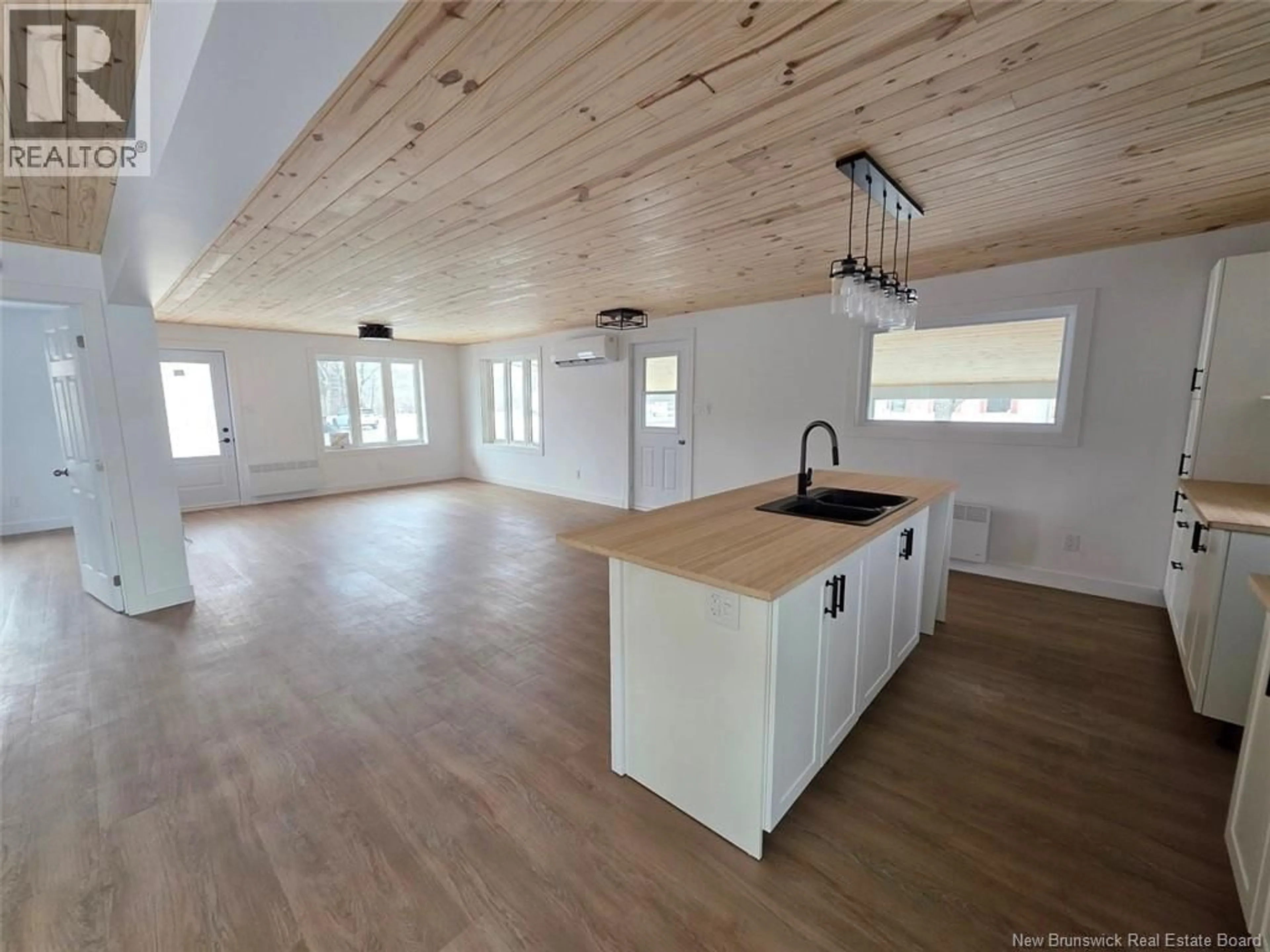 Open concept kitchen, wood/laminate floor for 195 PRINCIPALE STREET, Sainte-Anne-De-Madawaska New Brunswick E7E1B8
