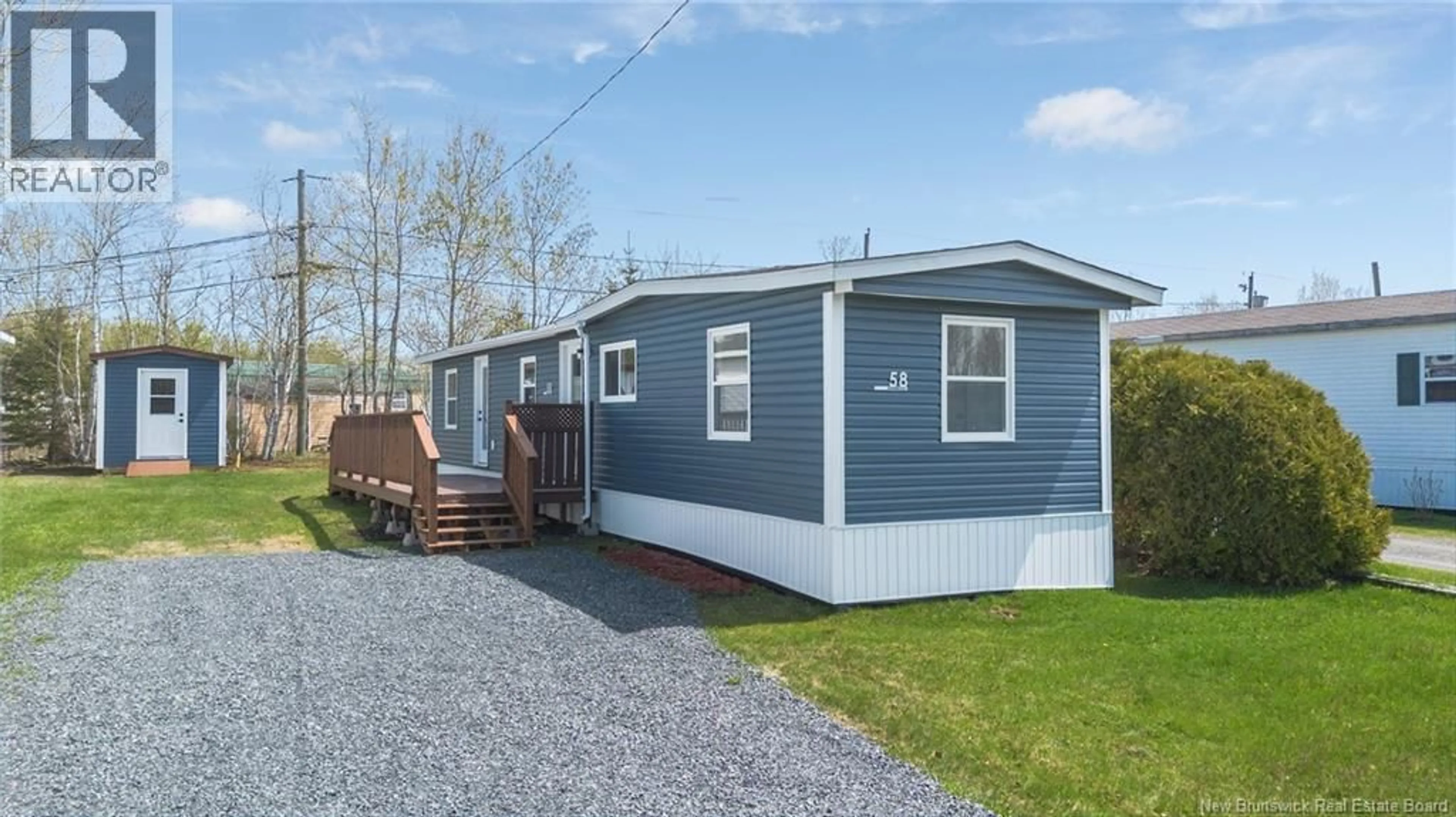 Home with vinyl exterior material, street for 58 NORTHWOOD STREET, Fredericton New Brunswick E3B6R3