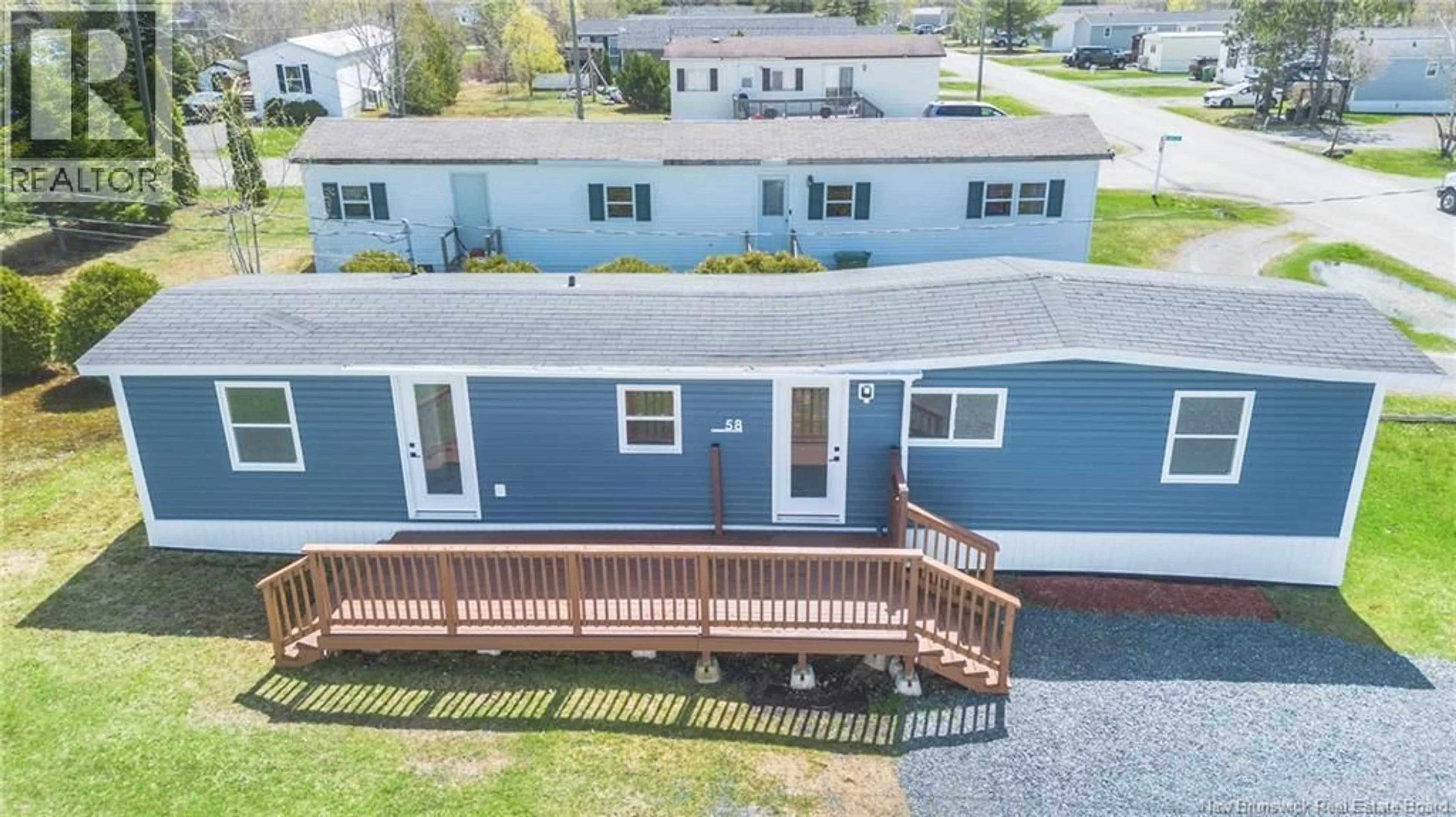 A pic from outside/outdoor area/front of a property/back of a property/a pic from drone, unknown for 58 NORTHWOOD STREET, Fredericton New Brunswick E3B6R3