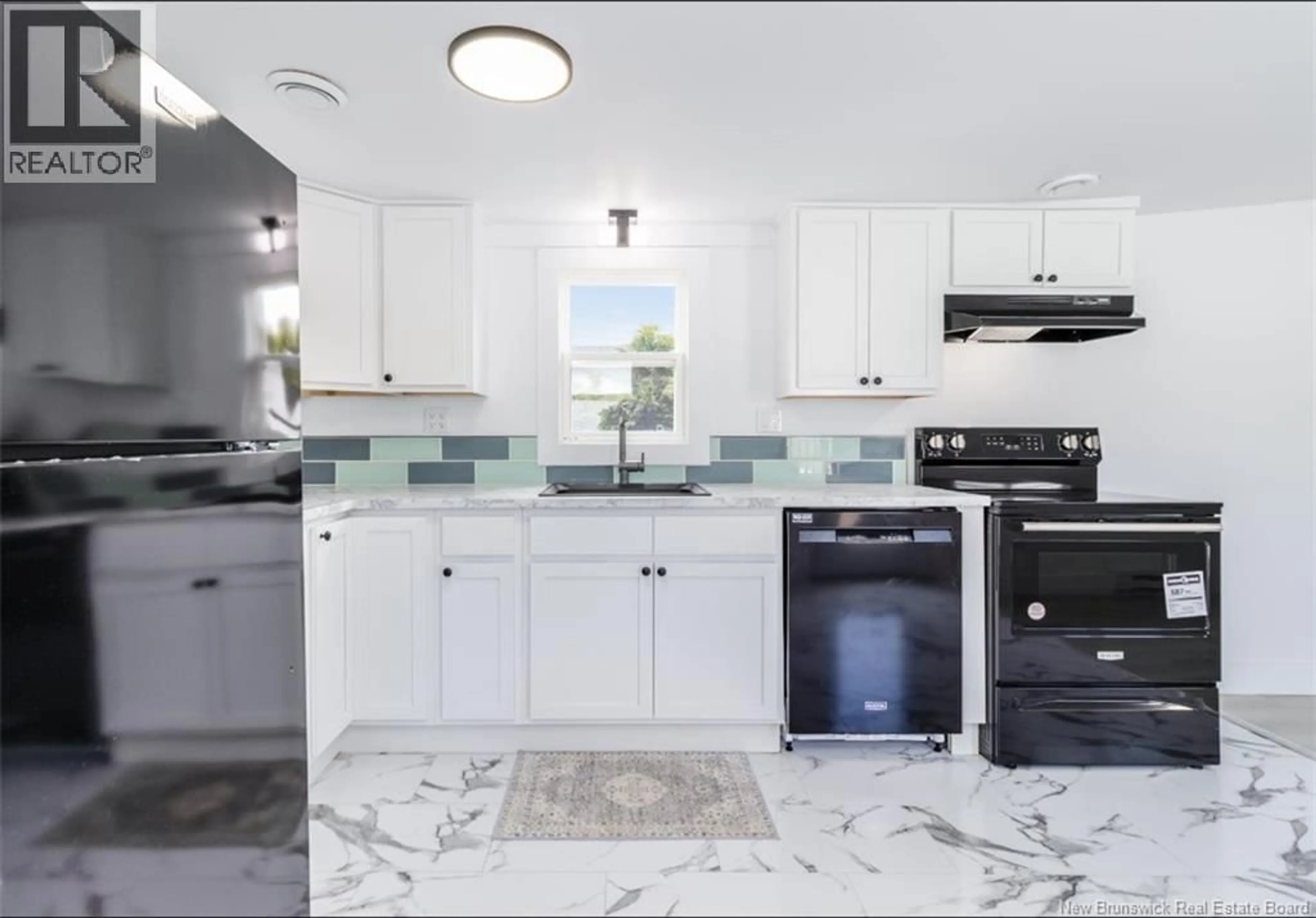 Open concept kitchen, ceramic/tile floor for 58 NORTHWOOD STREET, Fredericton New Brunswick E3B6R3