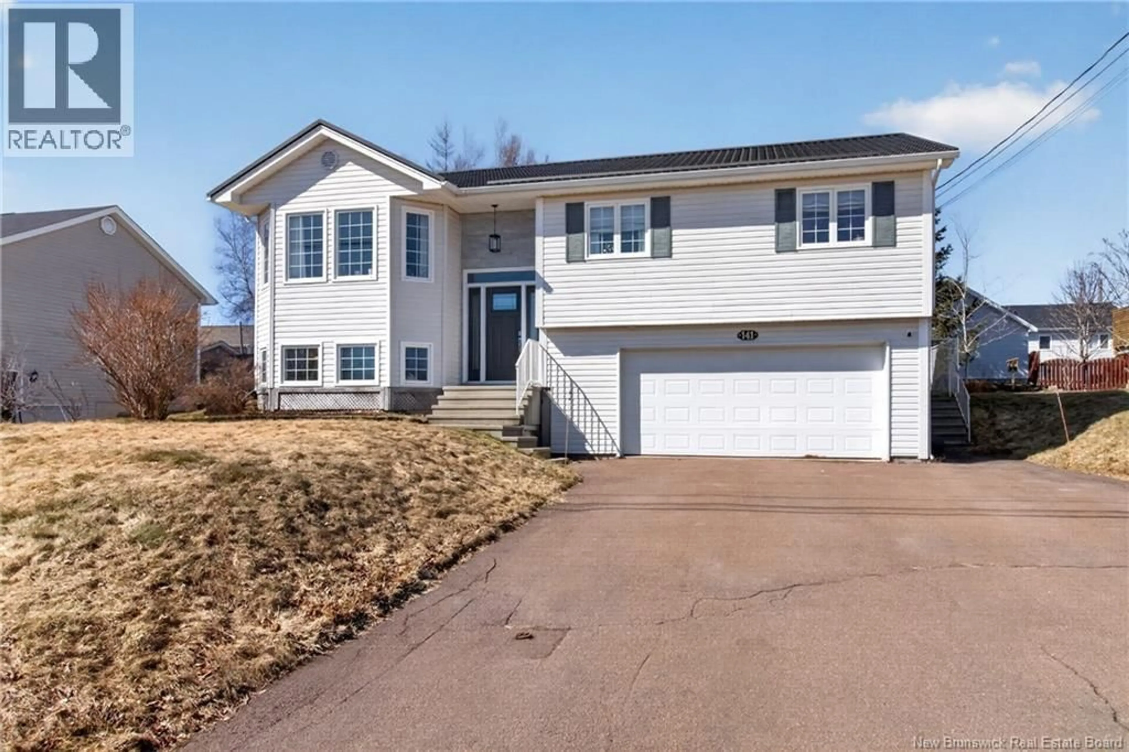 Home with vinyl exterior material, street for 141 GILBERT FINN, Dieppe New Brunswick E1A8B8