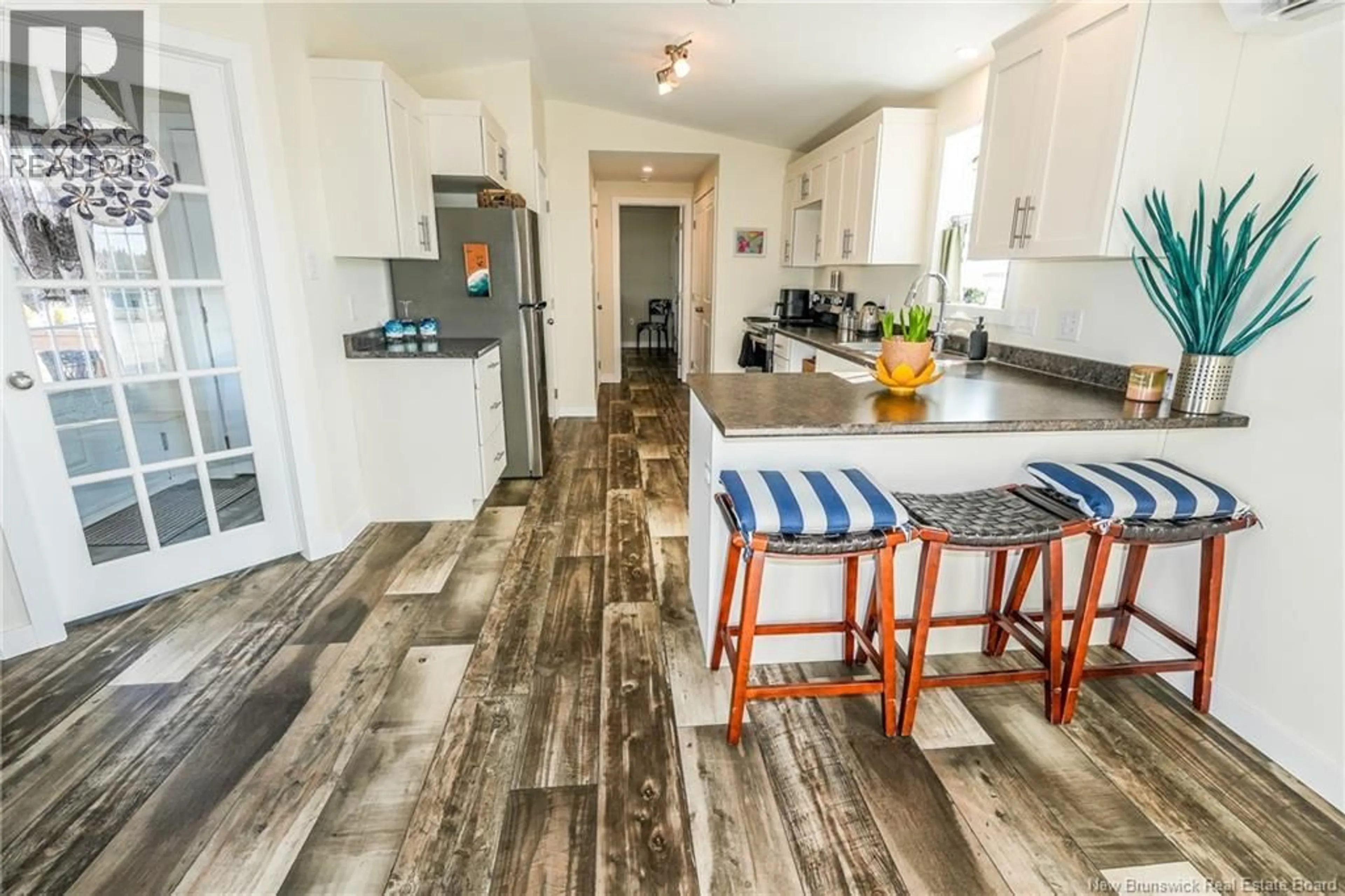 Open concept kitchen, ceramic/tile floor for 35 HARVEST LANE, St George New Brunswick E5C0J3