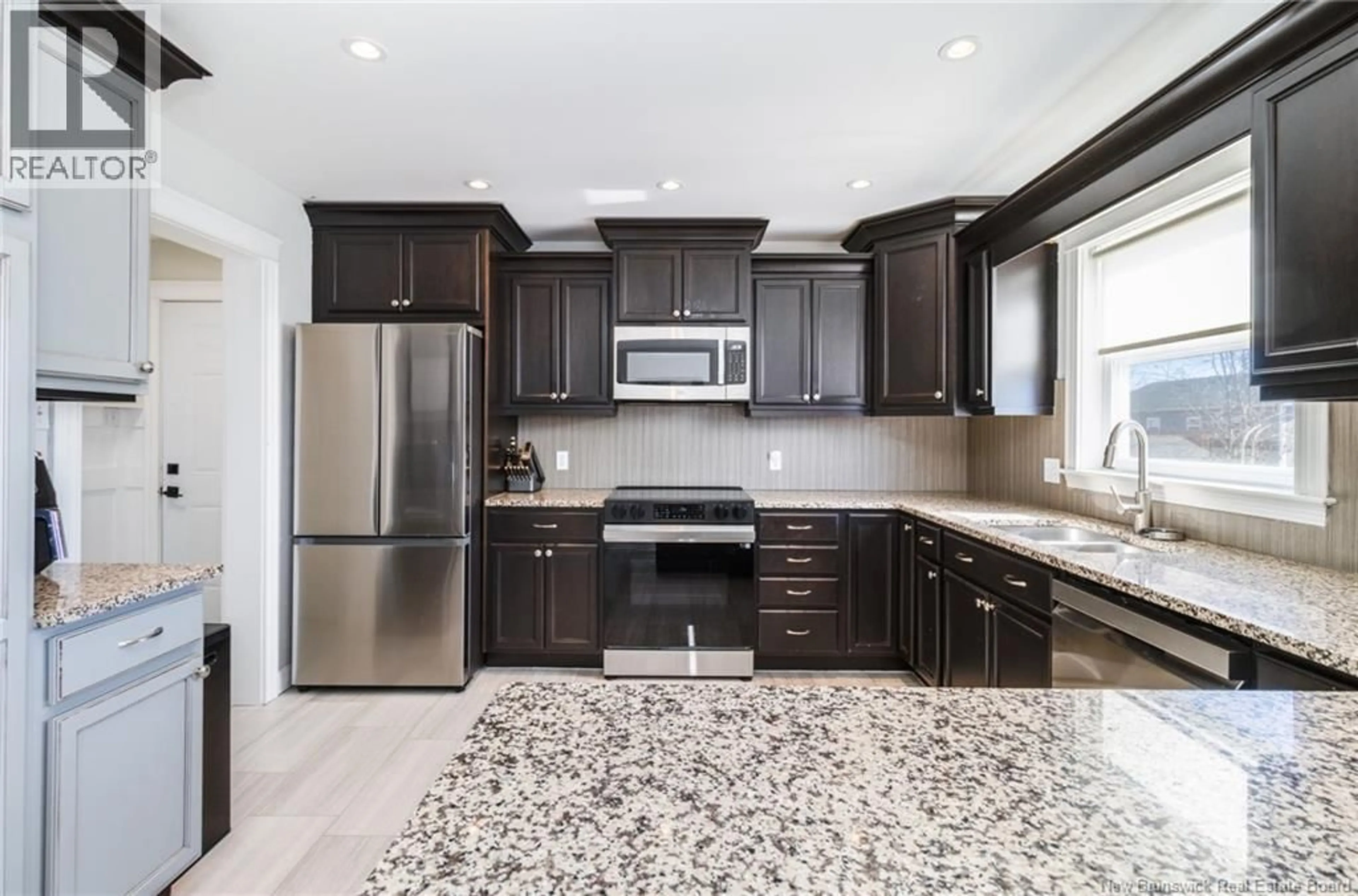 Open concept kitchen, ceramic/tile floor for 20 KNOWLTON CRESCENT, Oromocto New Brunswick E2V4S8