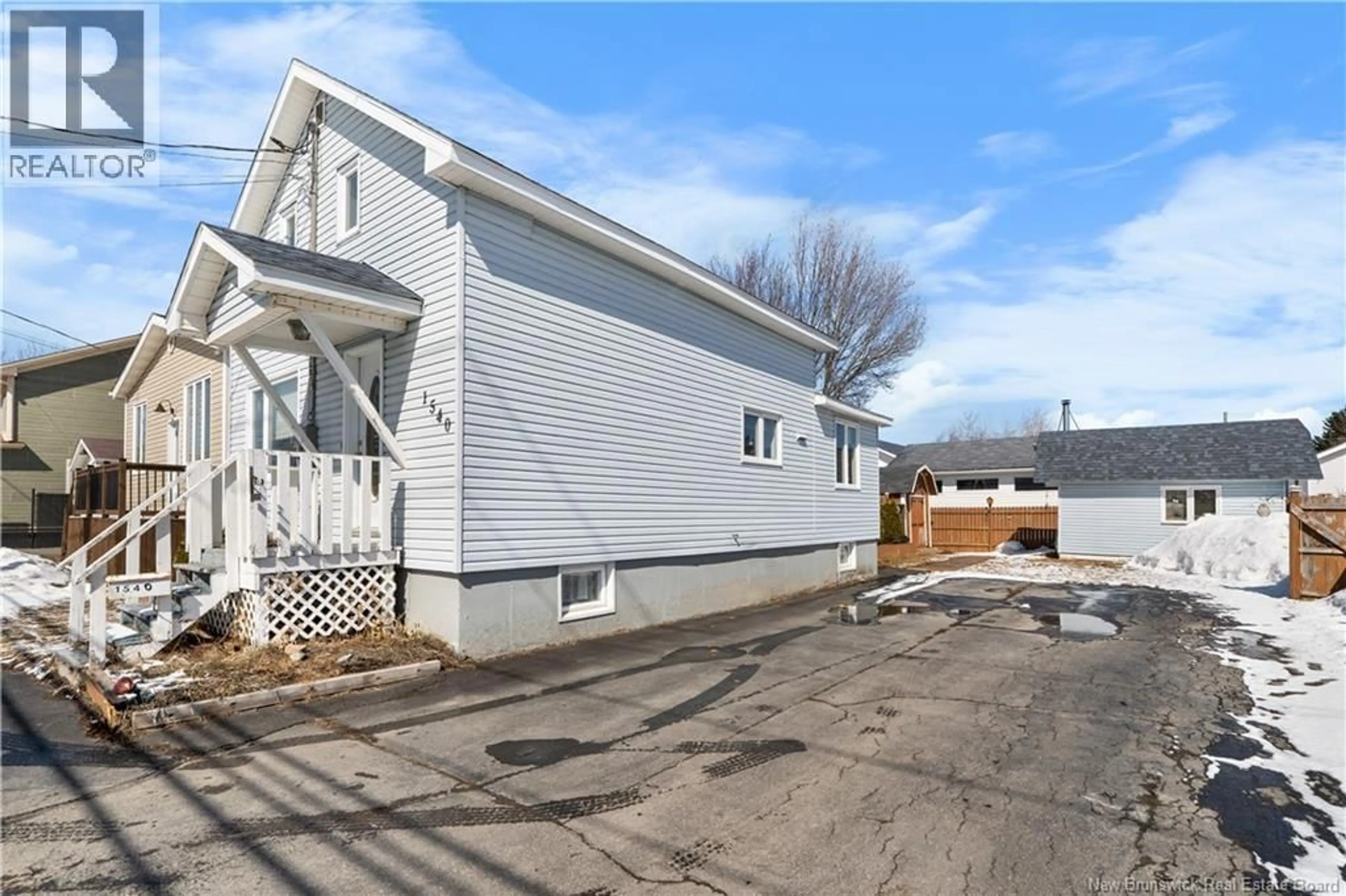 Home with vinyl exterior material, street for 1540 SUNSET DRIVE, Bathurst New Brunswick E2A3P3