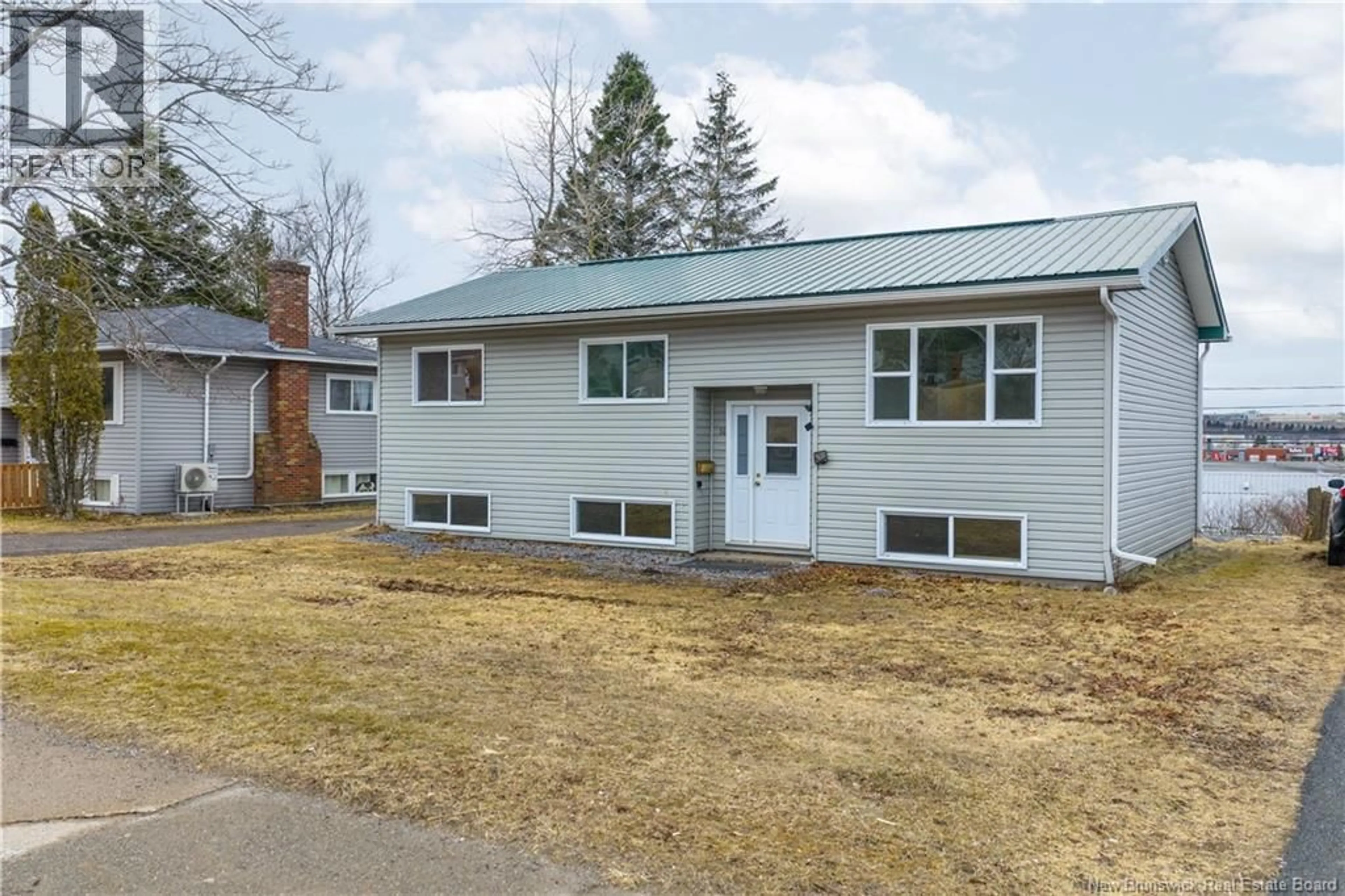 Home with vinyl exterior material, street for 14 MOUNTAIN ROAD, Saint John New Brunswick E2J2W8