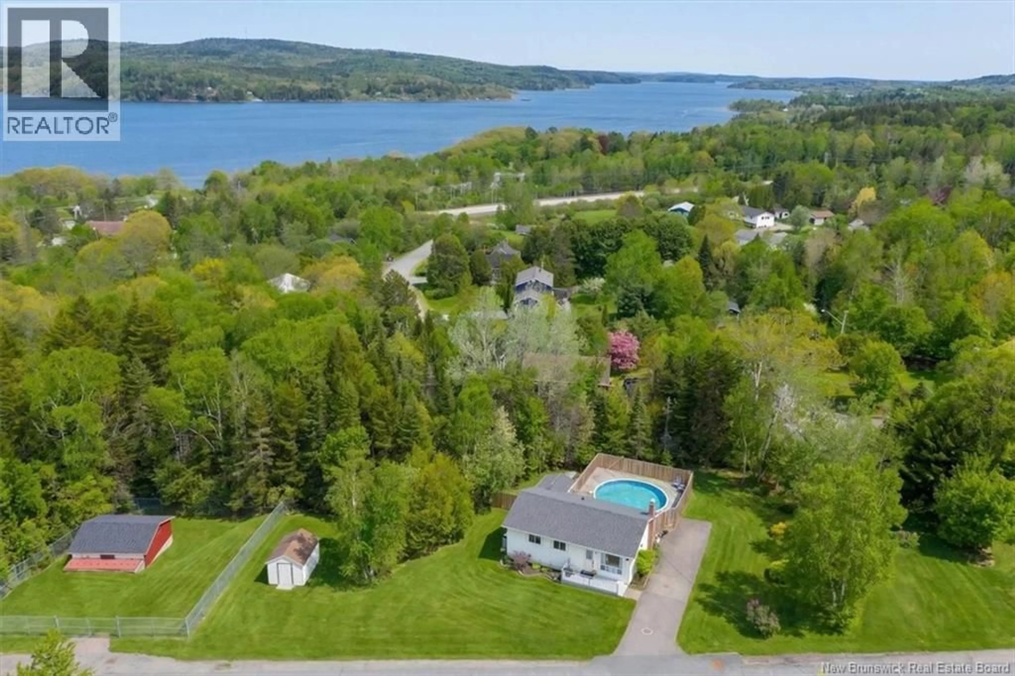 A pic from outside/outdoor area/front of a property/back of a property/a pic from drone, water/lake/river/ocean view for 29 MACLEAN ROAD, Grand Bay-Westfield New Brunswick E2K3J9