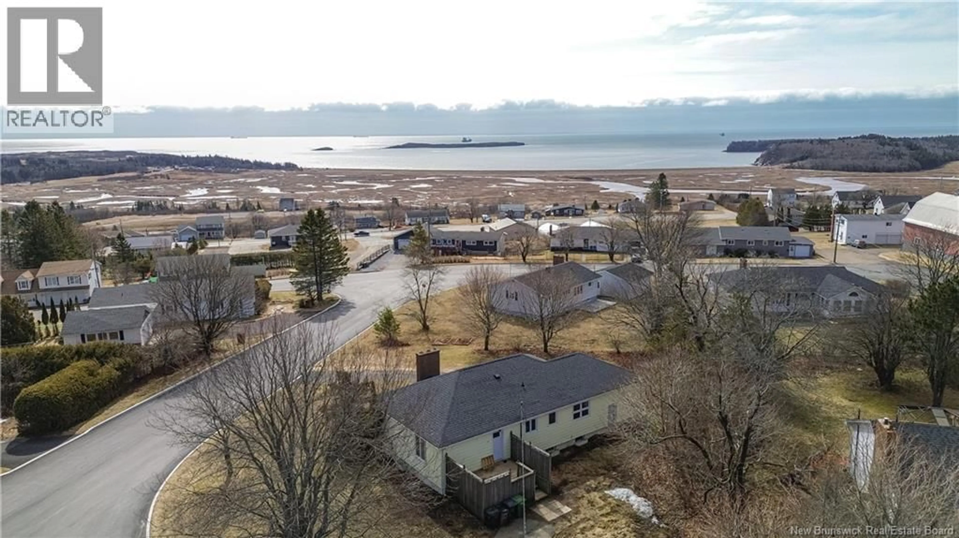A pic from outside/outdoor area/front of a property/back of a property/a pic from drone, water/lake/river/ocean view for 461 RIDGE ROW ROW, Saint John New Brunswick E2M4A3