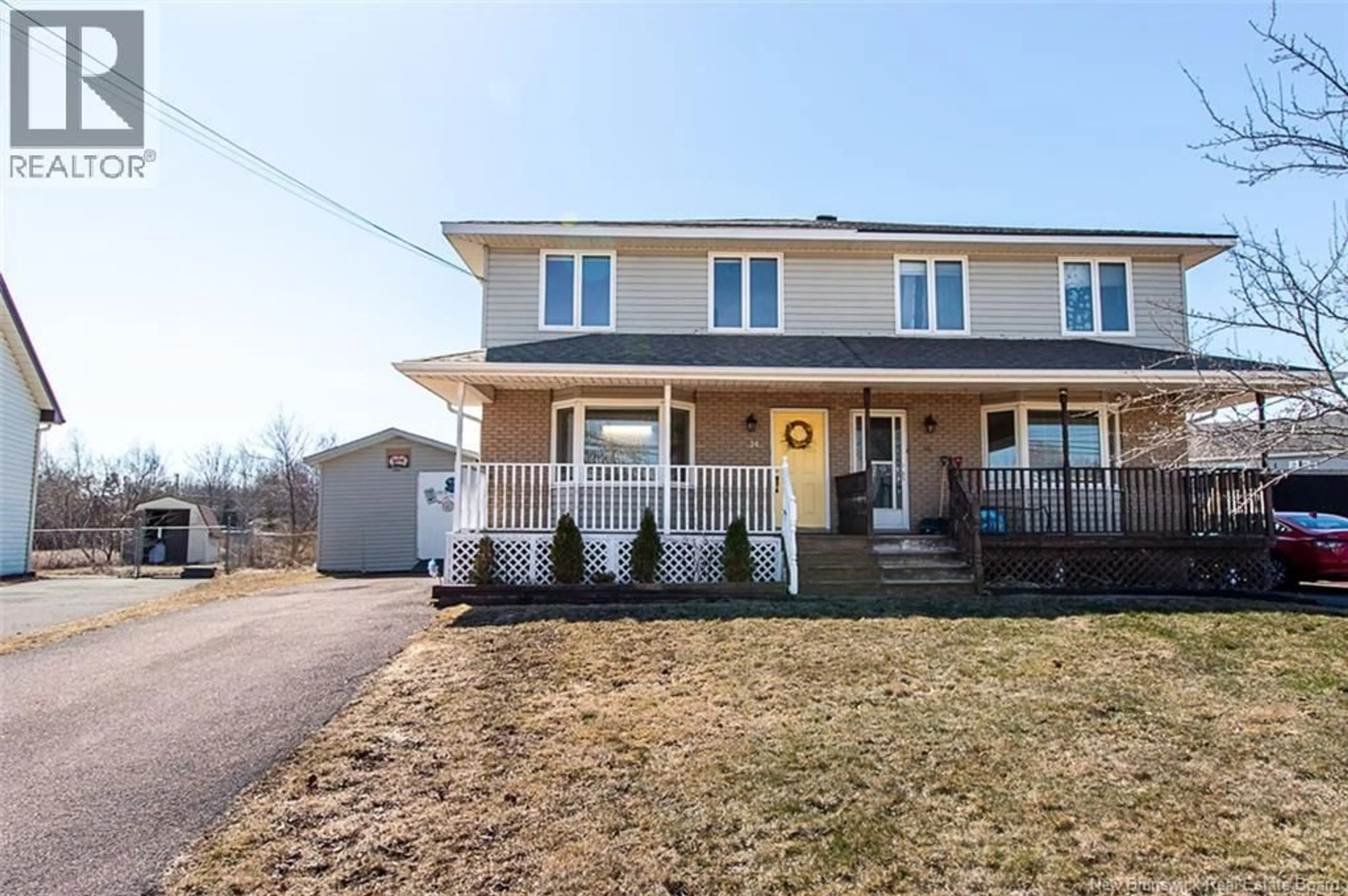 Home with vinyl exterior material, street for 34 RENNICK ROAD, Moncton New Brunswick E1G2G8