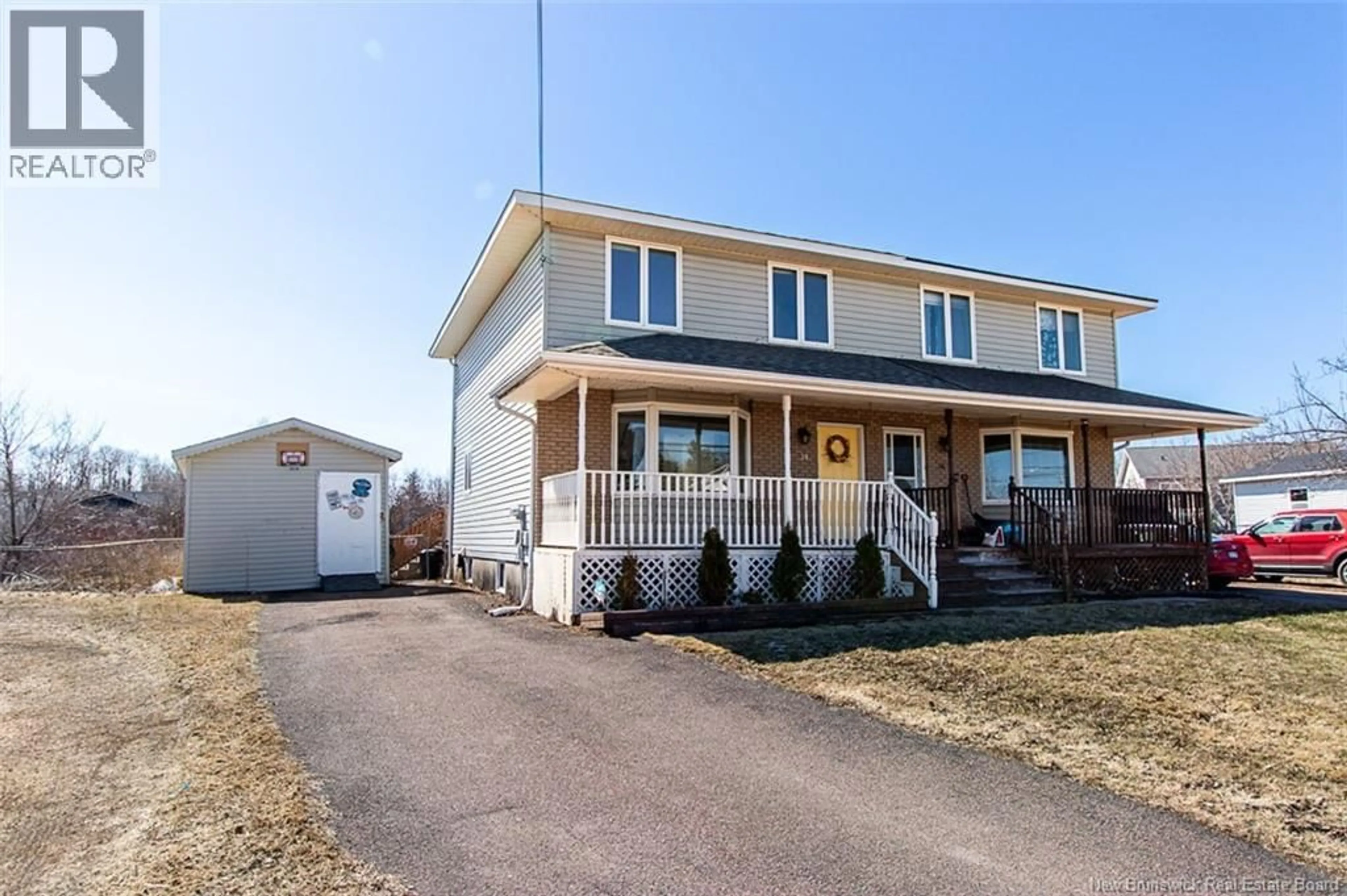Home with vinyl exterior material, street for 34 RENNICK ROAD, Moncton New Brunswick E1G2G8