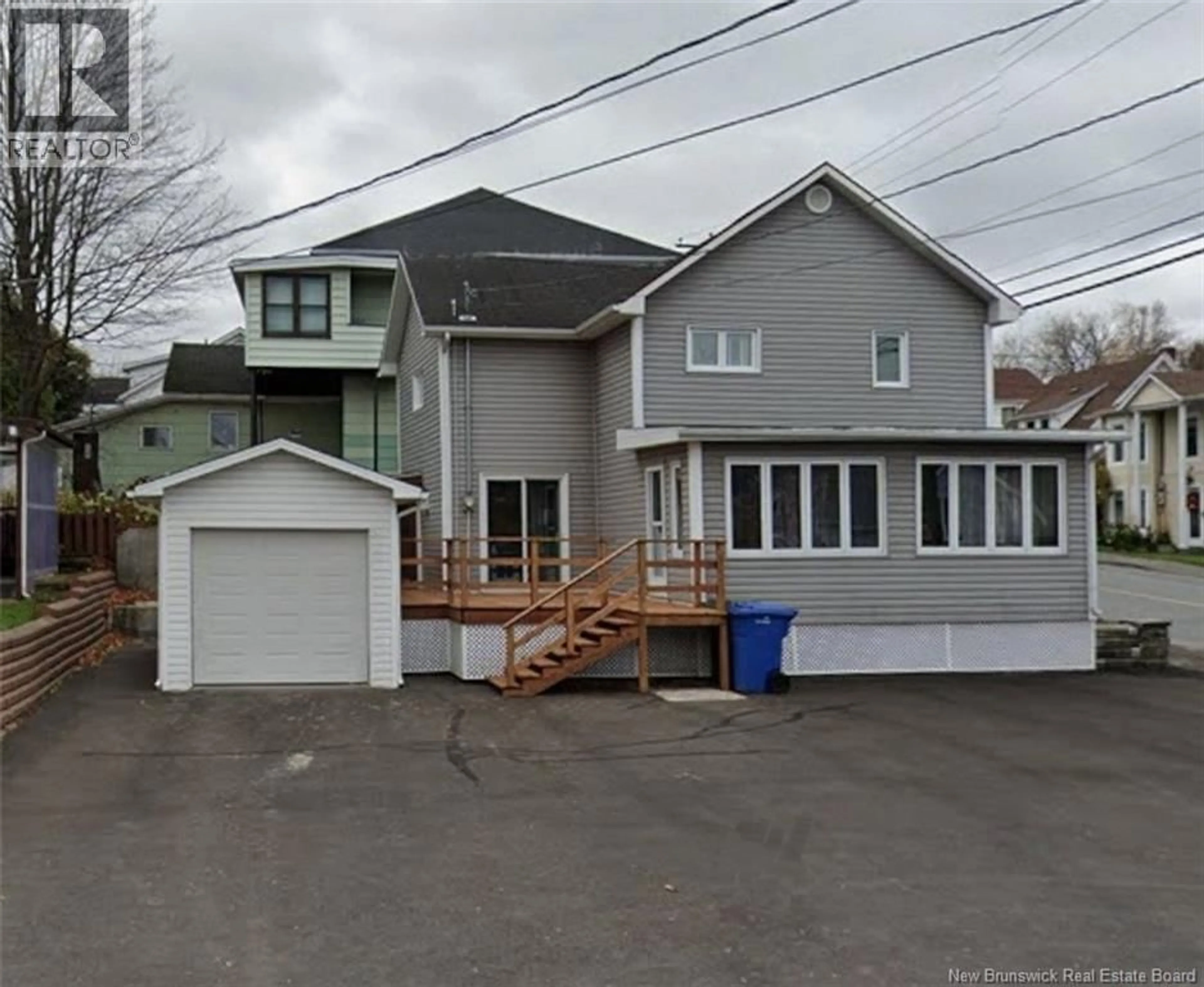 Home with vinyl exterior material, street for 49 ST-JEAN STREET, Edmundston New Brunswick E3V1C7