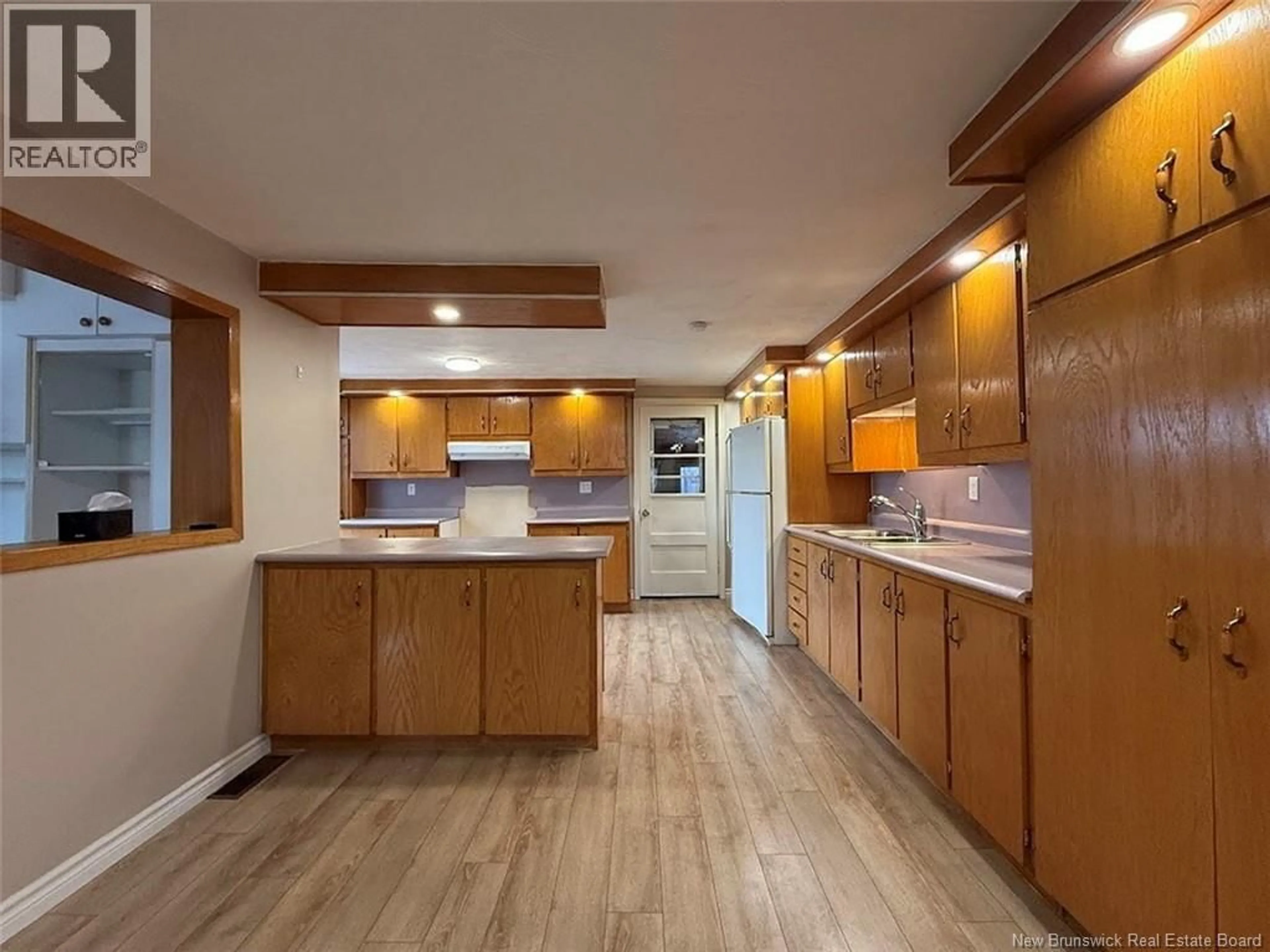 Open concept kitchen, unknown for 49 ST-JEAN STREET, Edmundston New Brunswick E3V1C7