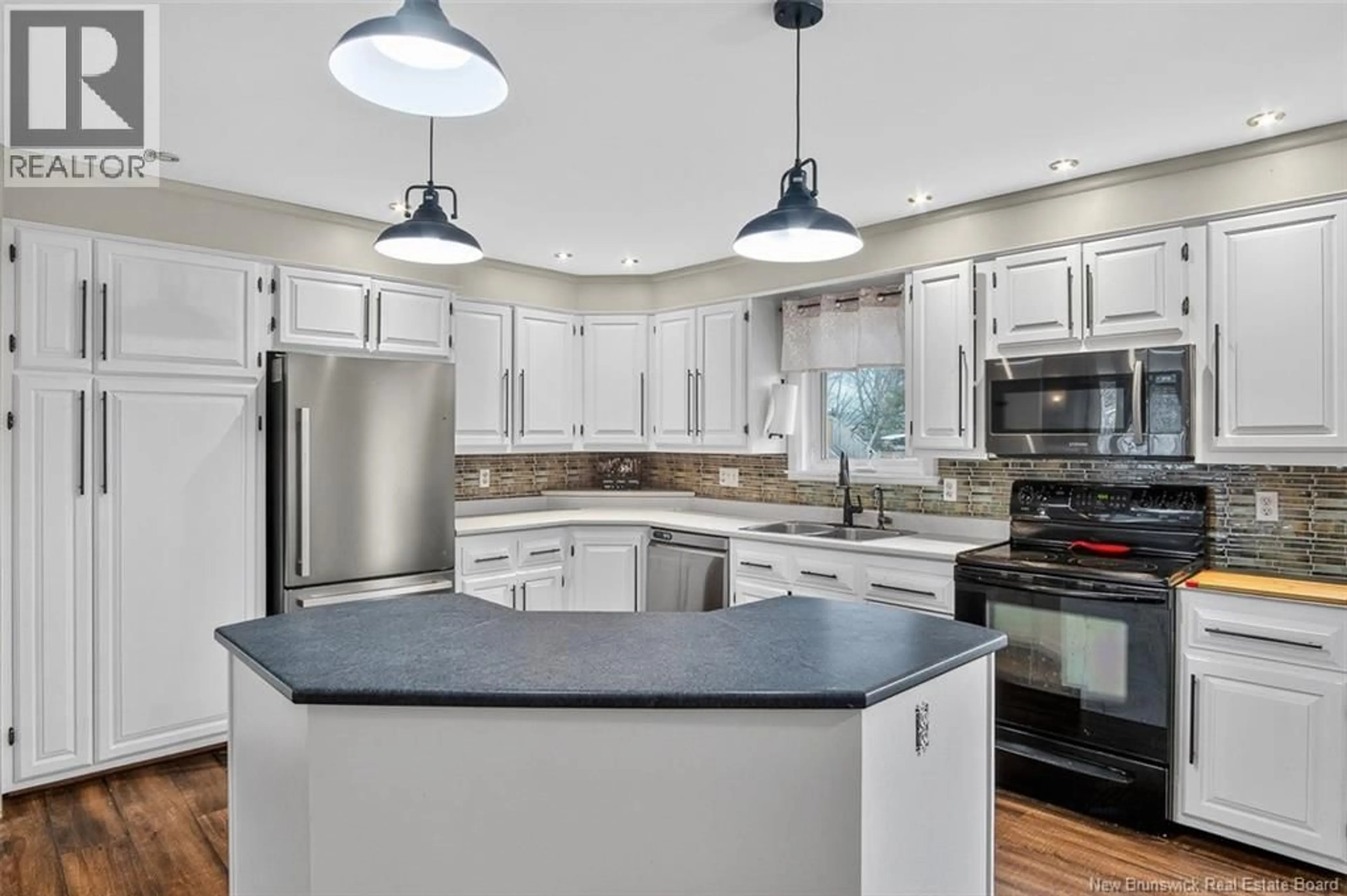 Open concept kitchen, ceramic/tile floor for 49 SWANTON DRIVE, Quispamsis New Brunswick E2E4T3