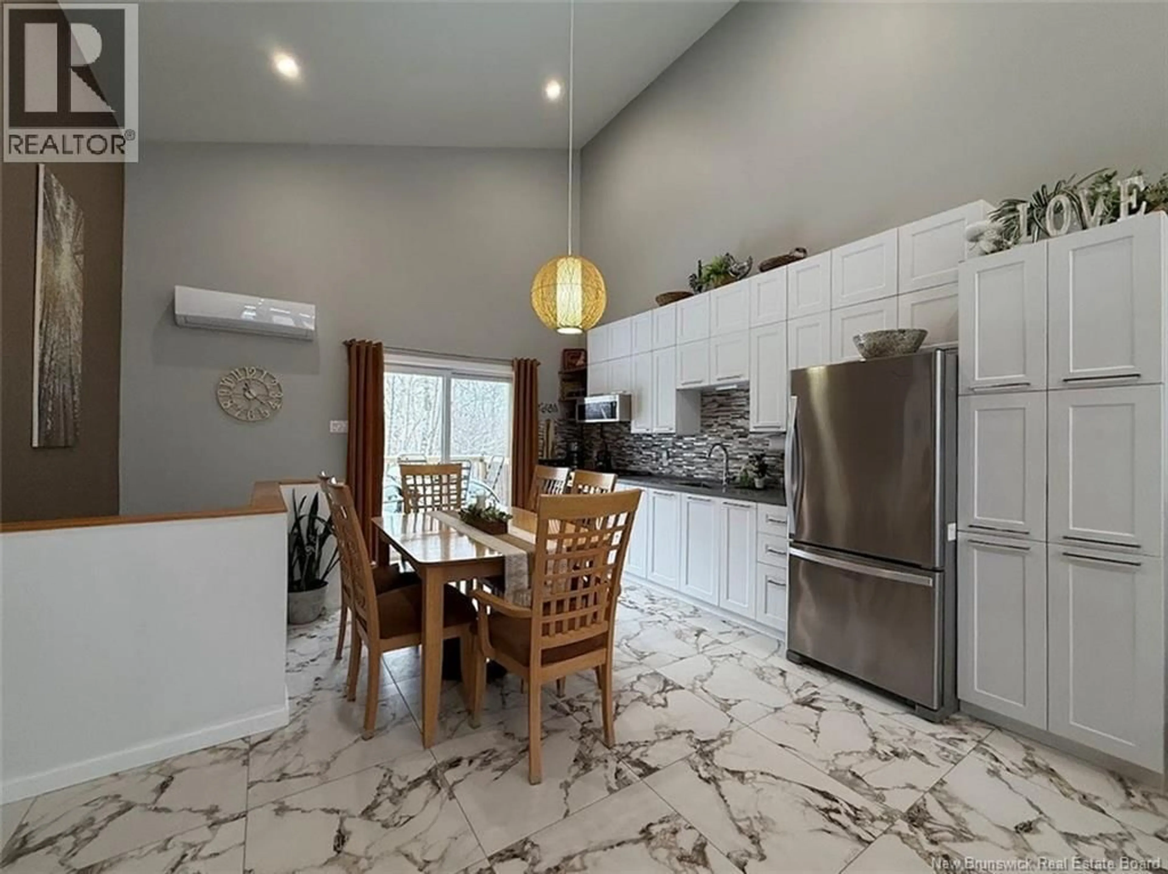 Open concept kitchen, ceramic/tile floor for 100 RIVIÈRE À LA TRUITE ROAD, Saint-Jacques New Brunswick E7B1Y7