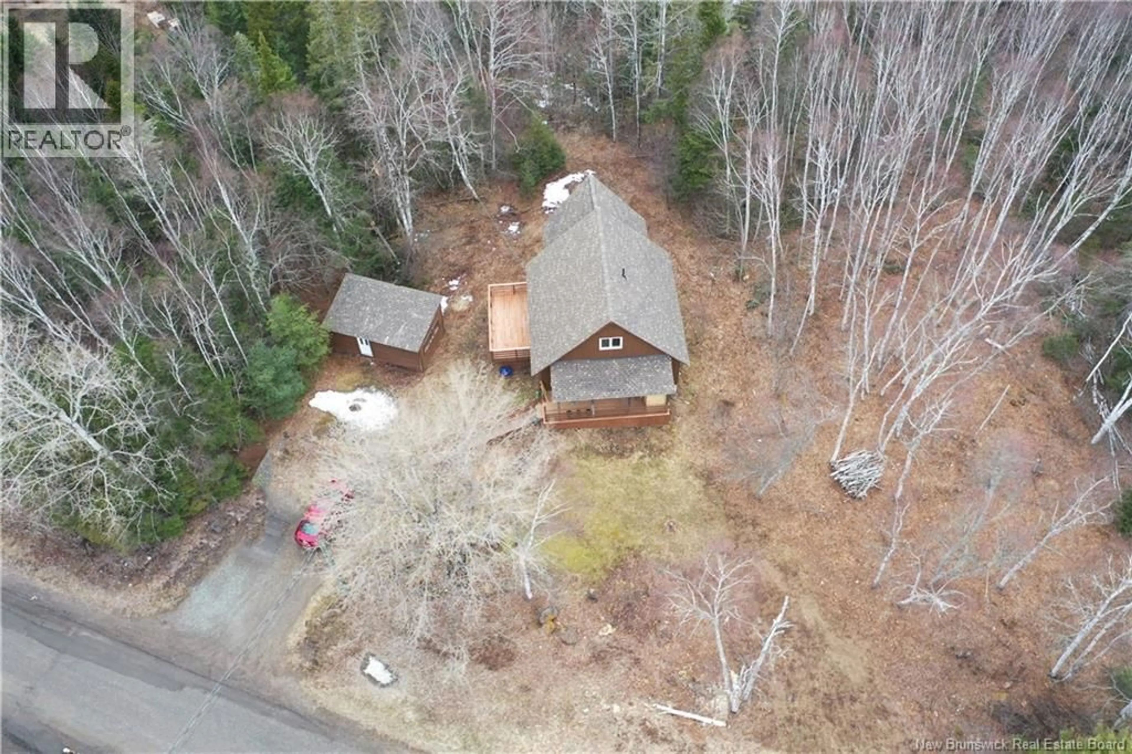 A pic from outside/outdoor area/front of a property/back of a property/a pic from drone, forest/trees view for 9 ORCHARD STREET, Passekeag New Brunswick E5N2B8