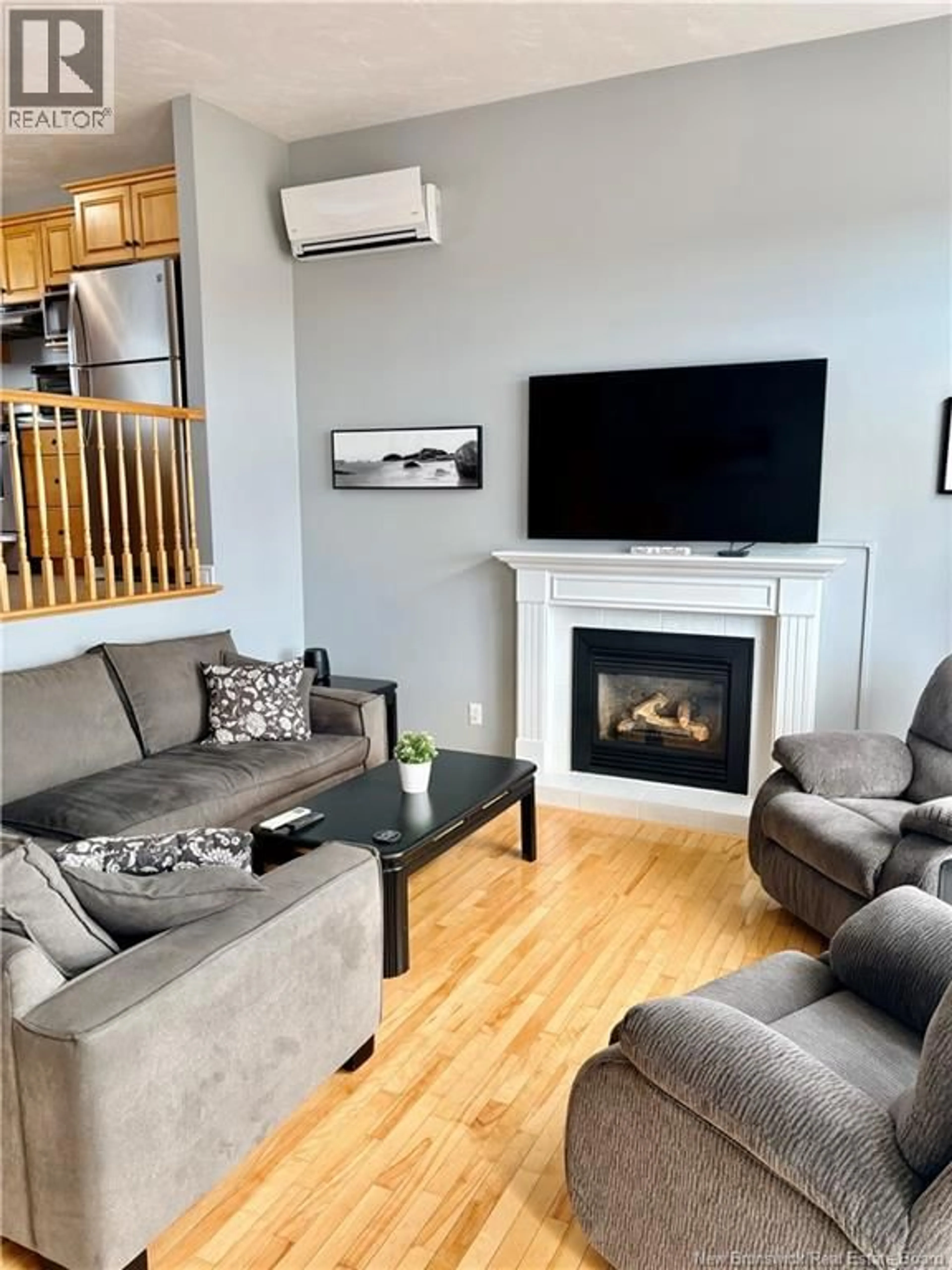 Living room with furniture, wood/laminate floor for 25 WINDY HILL, Indian Mountain New Brunswick E1G3B1