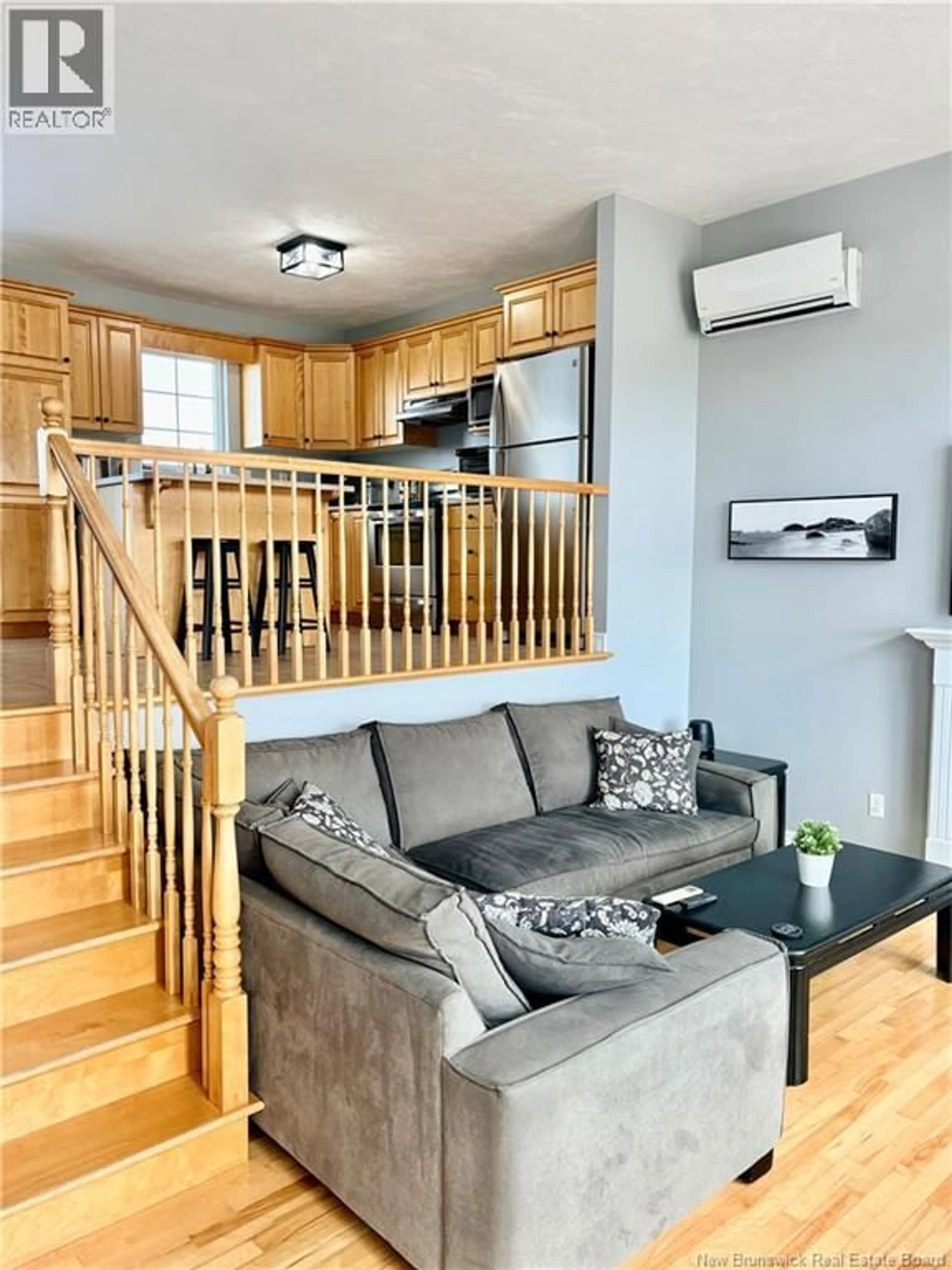 Living room with furniture, wood/laminate floor for 25 WINDY HILL, Indian Mountain New Brunswick E1G3B1