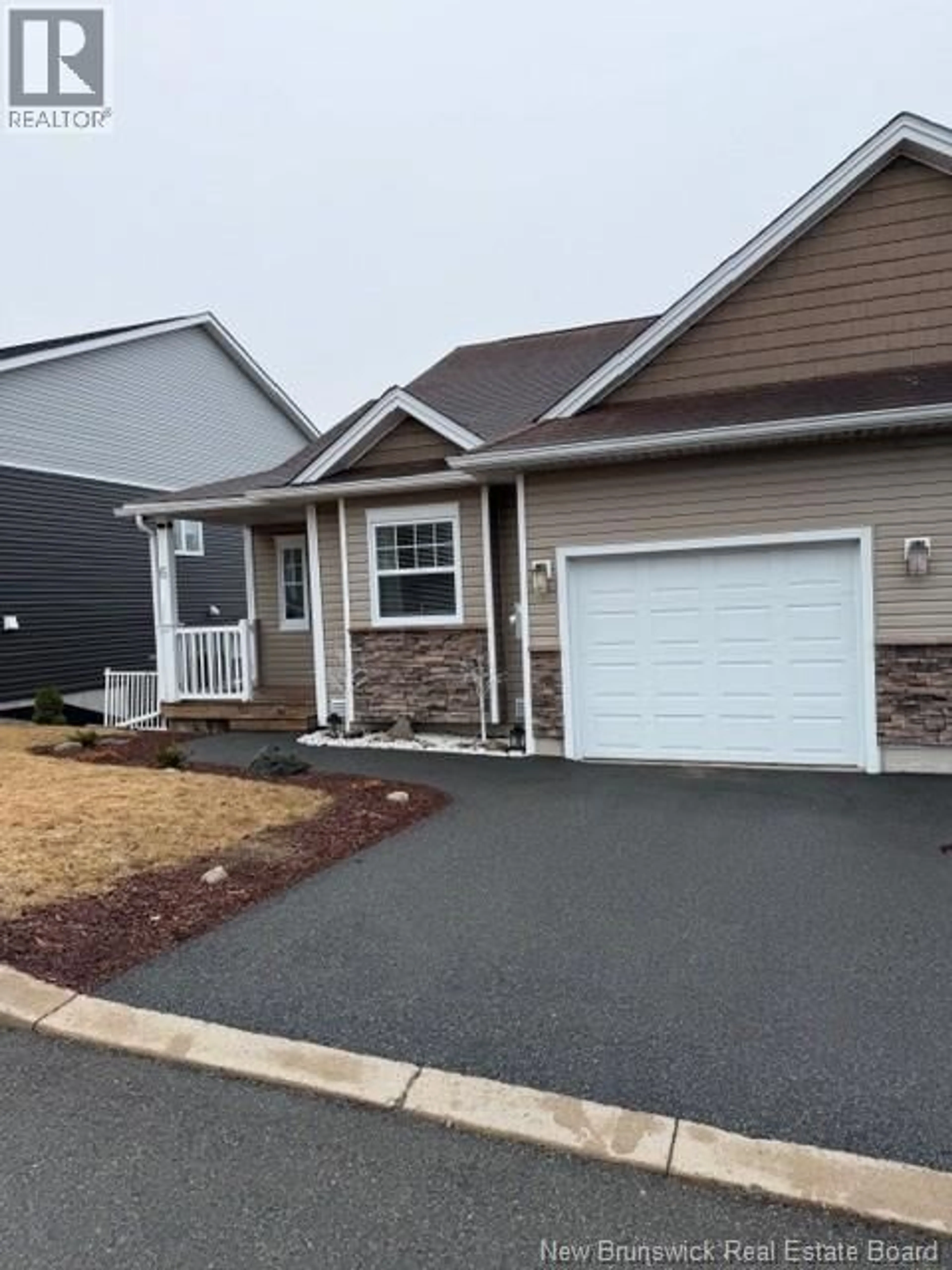 Home with vinyl exterior material, street for 6 BENT ANCHOR COURT, Saint John New Brunswick E2M0B8