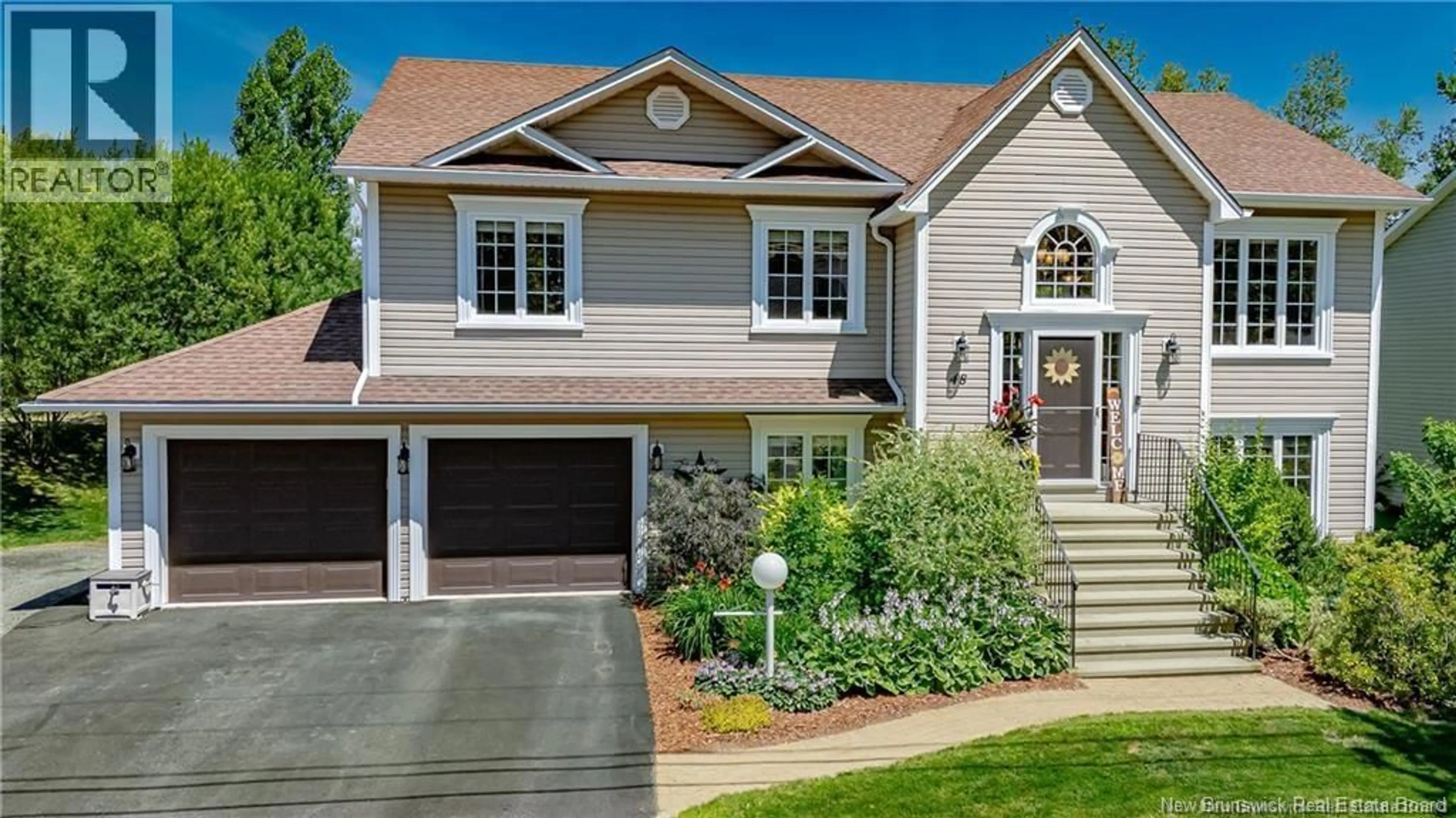 Home with vinyl exterior material, street for 48 PETERS DRIVE, Fredericton New Brunswick E3A0L2