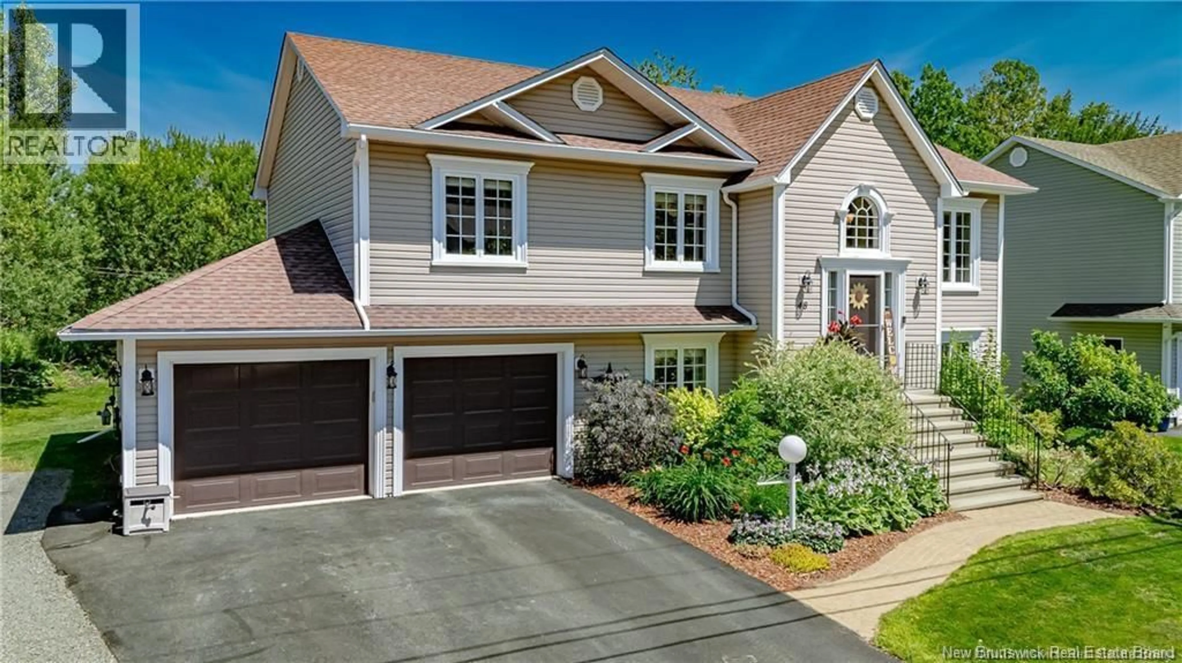 Home with vinyl exterior material, street for 48 PETERS DRIVE, Fredericton New Brunswick E3A0L2