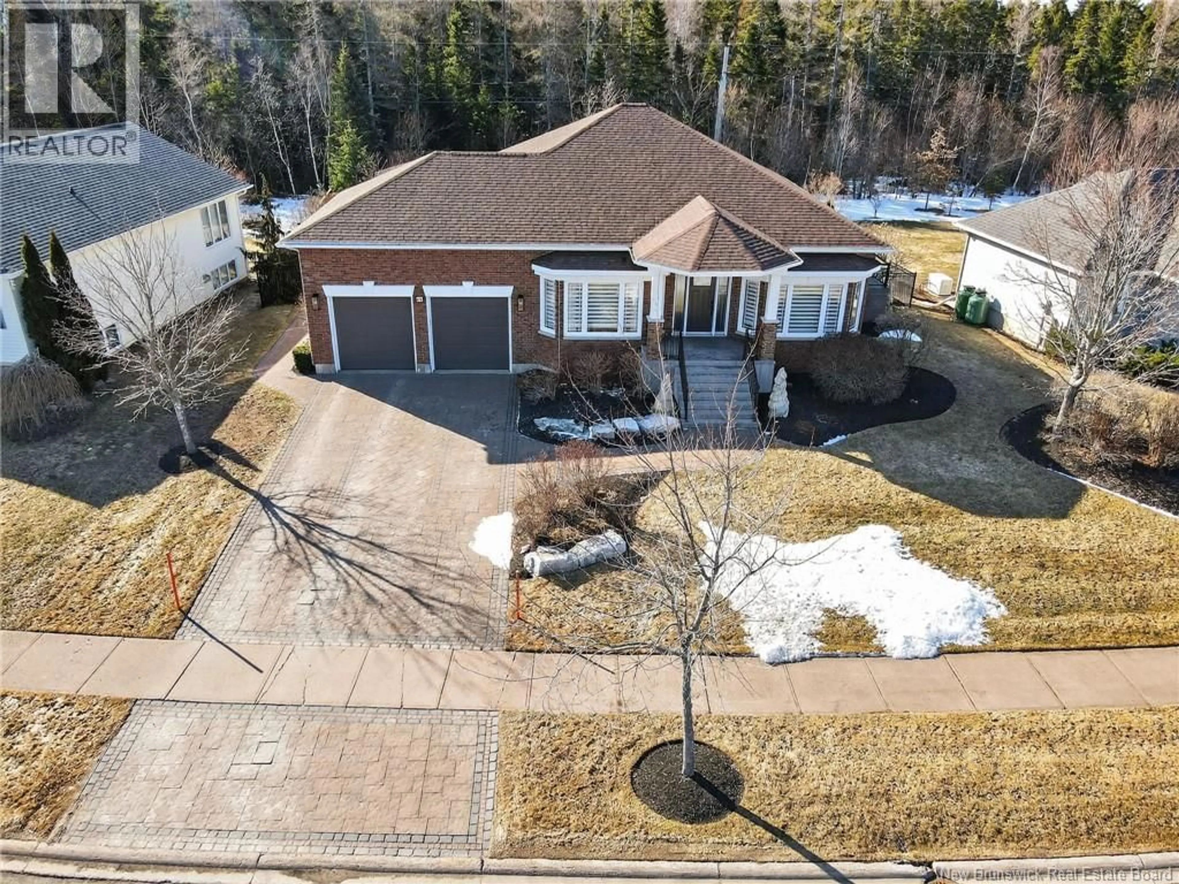 A pic from outside/outdoor area/front of a property/back of a property/a pic from drone, street for 60 ROYAL OAKS, Moncton New Brunswick E1H3P2