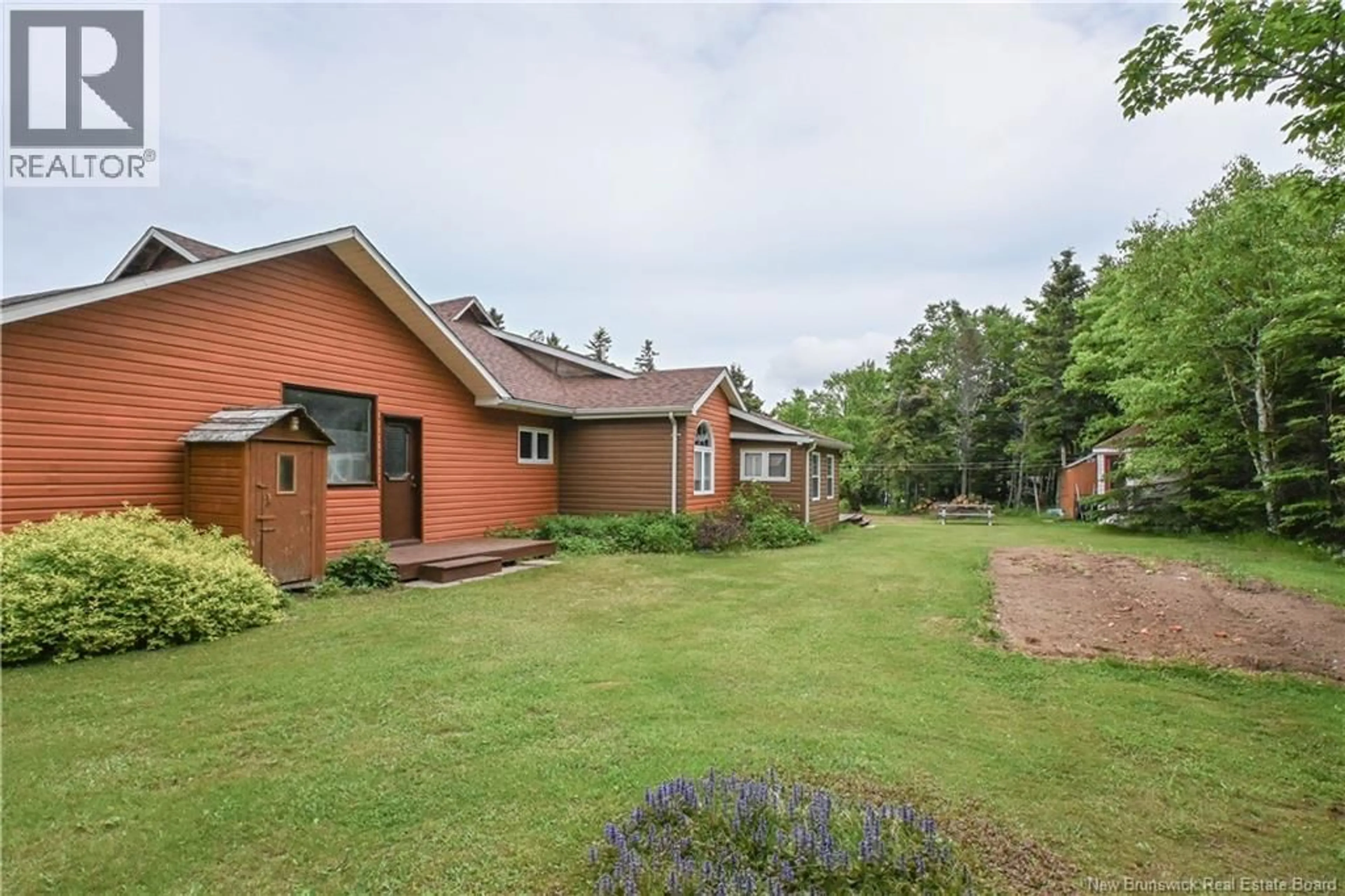 A pic from outside/outdoor area/front of a property/back of a property/a pic from drone, unknown for 4 JADI LANE, Chiasson Office New Brunswick E8S2S6