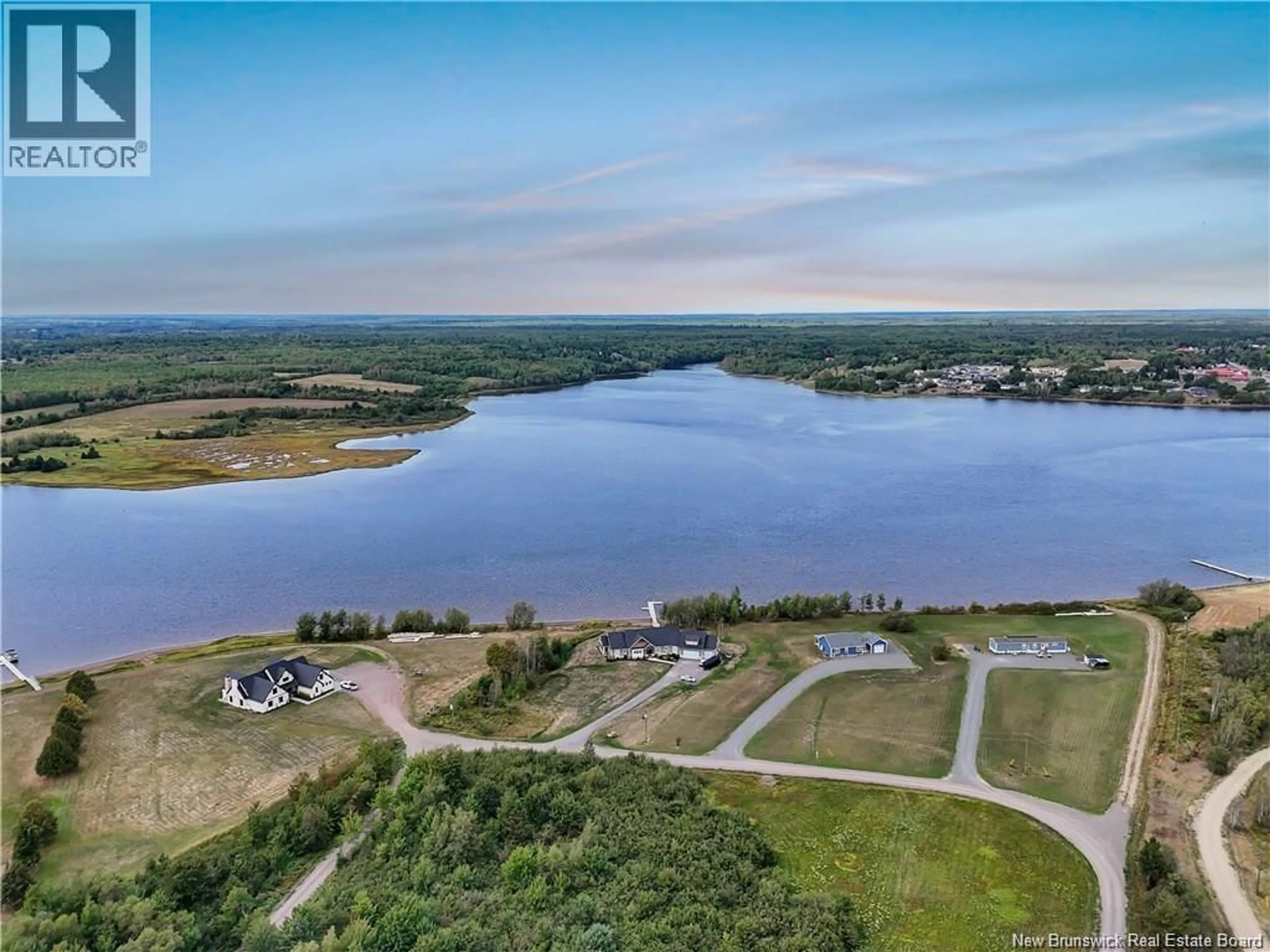 A pic from outside/outdoor area/front of a property/back of a property/a pic from drone, water/lake/river/ocean view for 34 MCKINNON, Main River New Brunswick E4T1T8