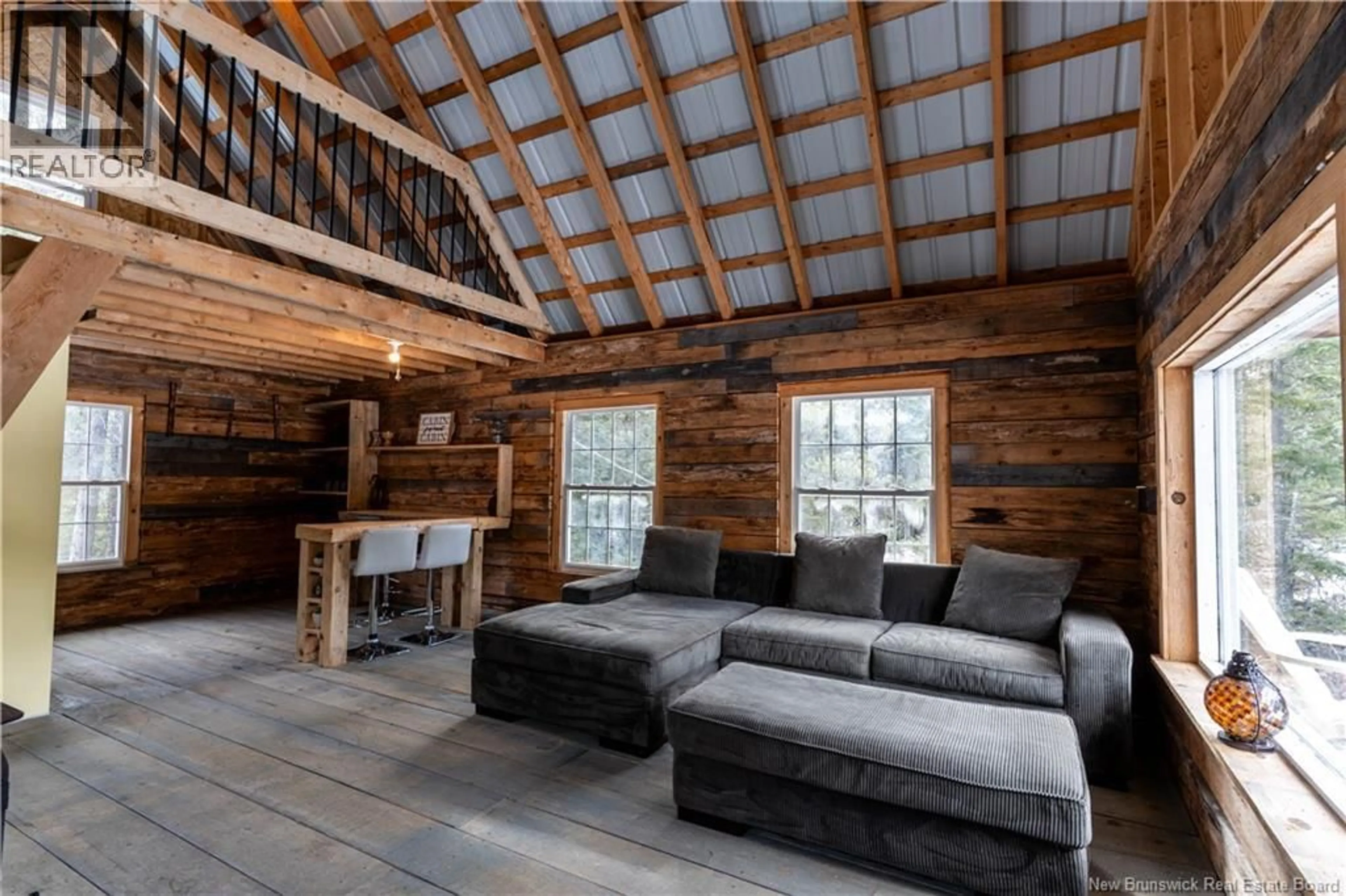 Living room with furniture, wood/laminate floor for 17.1 HEC HOWARD RD, Howard New Brunswick E9B2E1