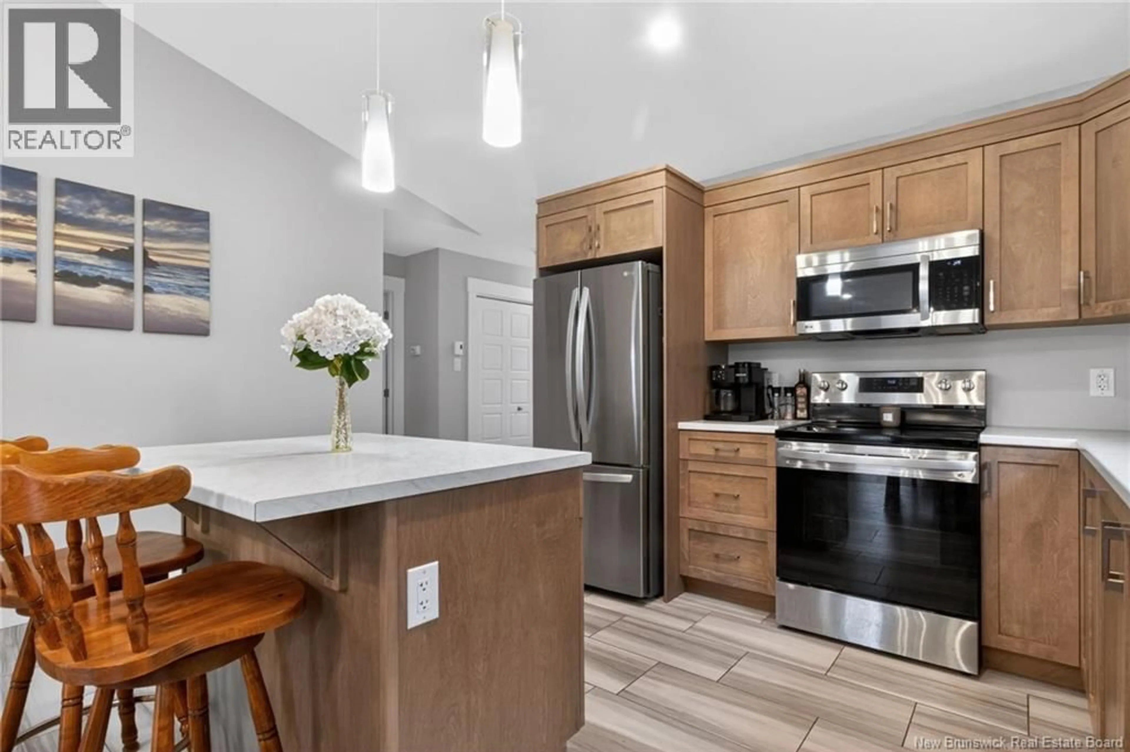 Open concept kitchen, ceramic/tile floor for 66 ANASTASIA CRESCENT, Moncton New Brunswick E1E0E4
