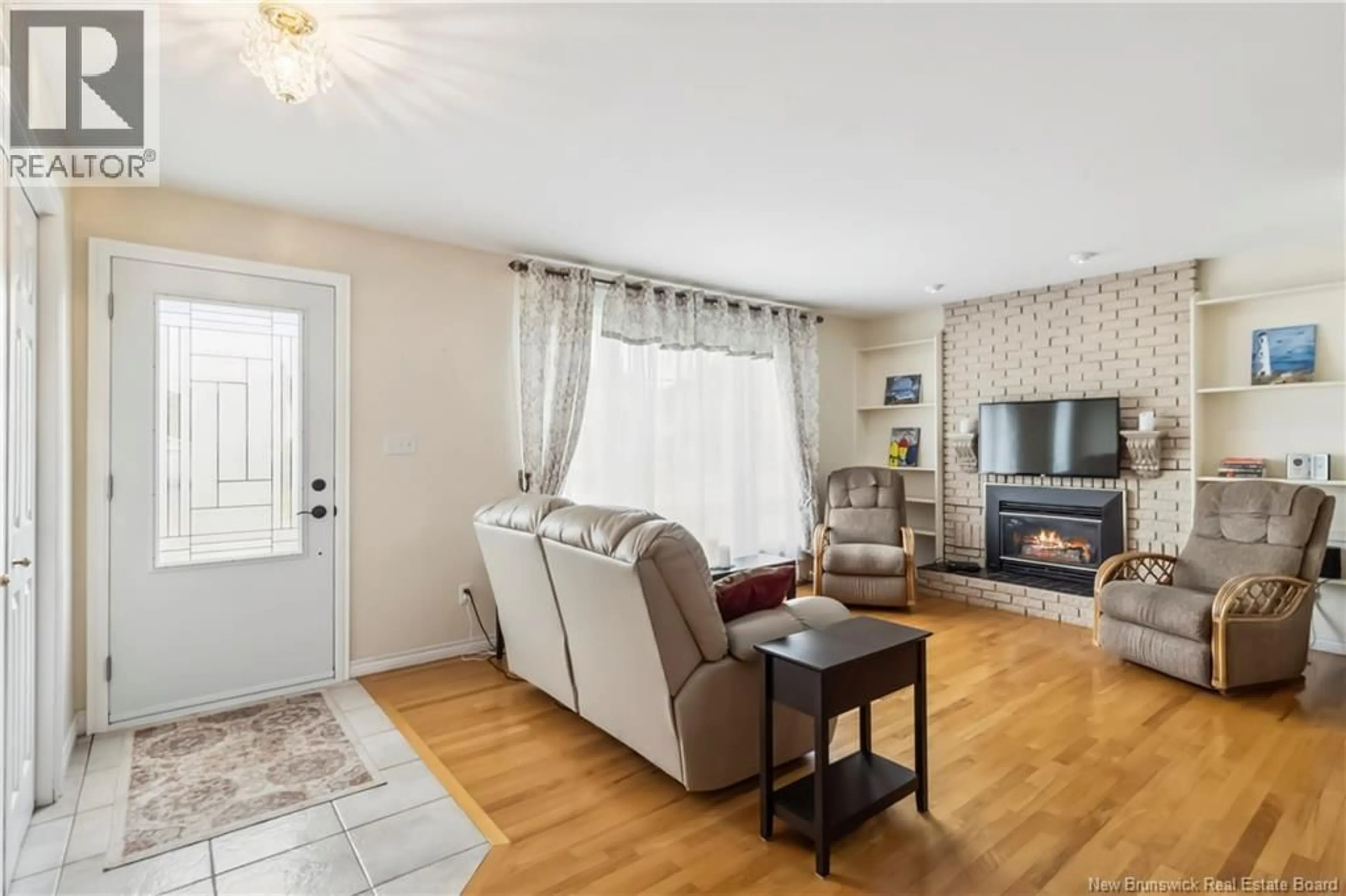 Living room with furniture, wood/laminate floor for 45 BOLTON STREET, Moncton New Brunswick E1E2H5