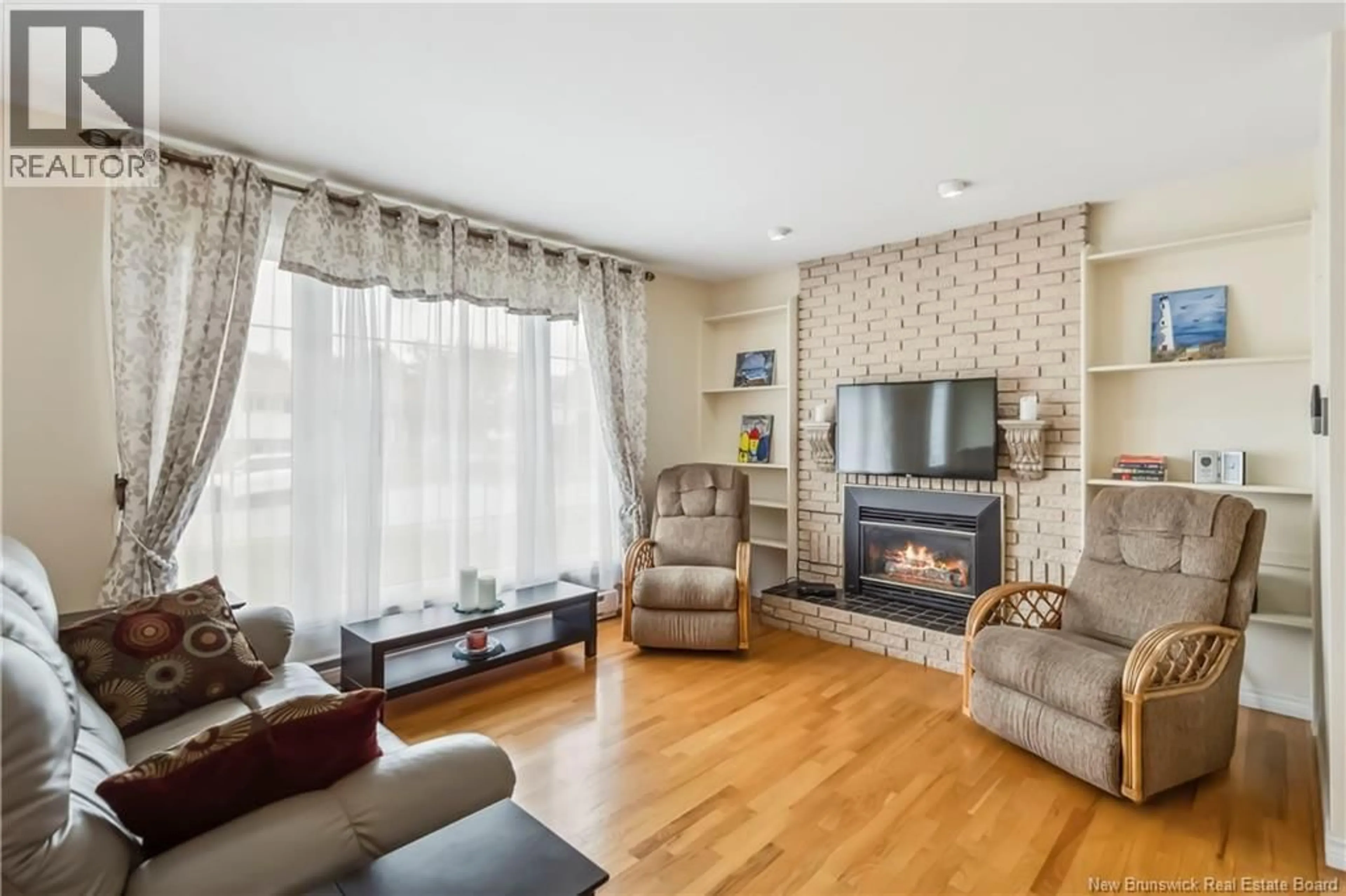 Living room with furniture, wood/laminate floor for 45 BOLTON STREET, Moncton New Brunswick E1E2H5