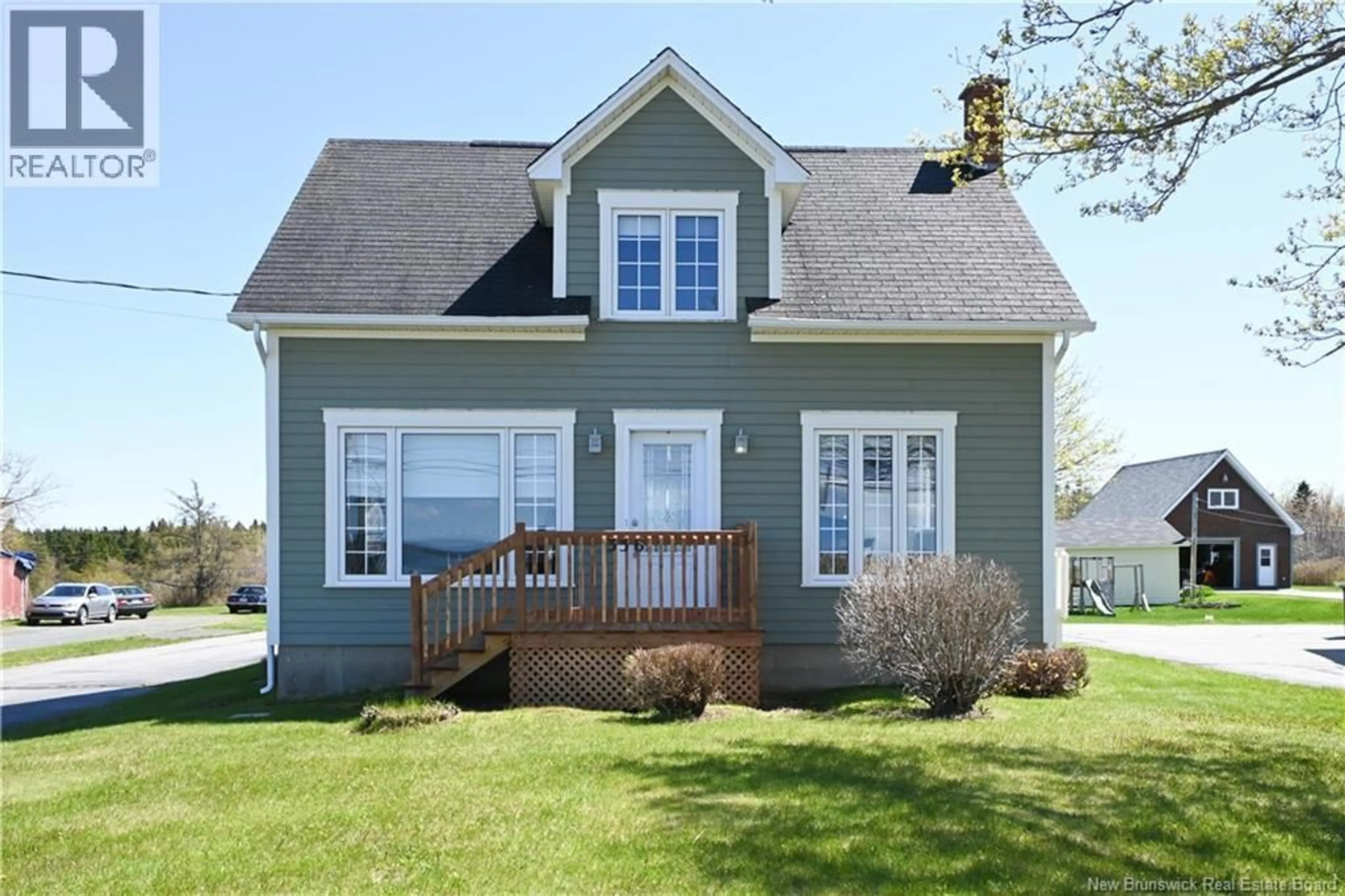 Home with vinyl exterior material, street for 336 SAINT-PIERRE BOULEVARD, Caraquet New Brunswick E1W1B4