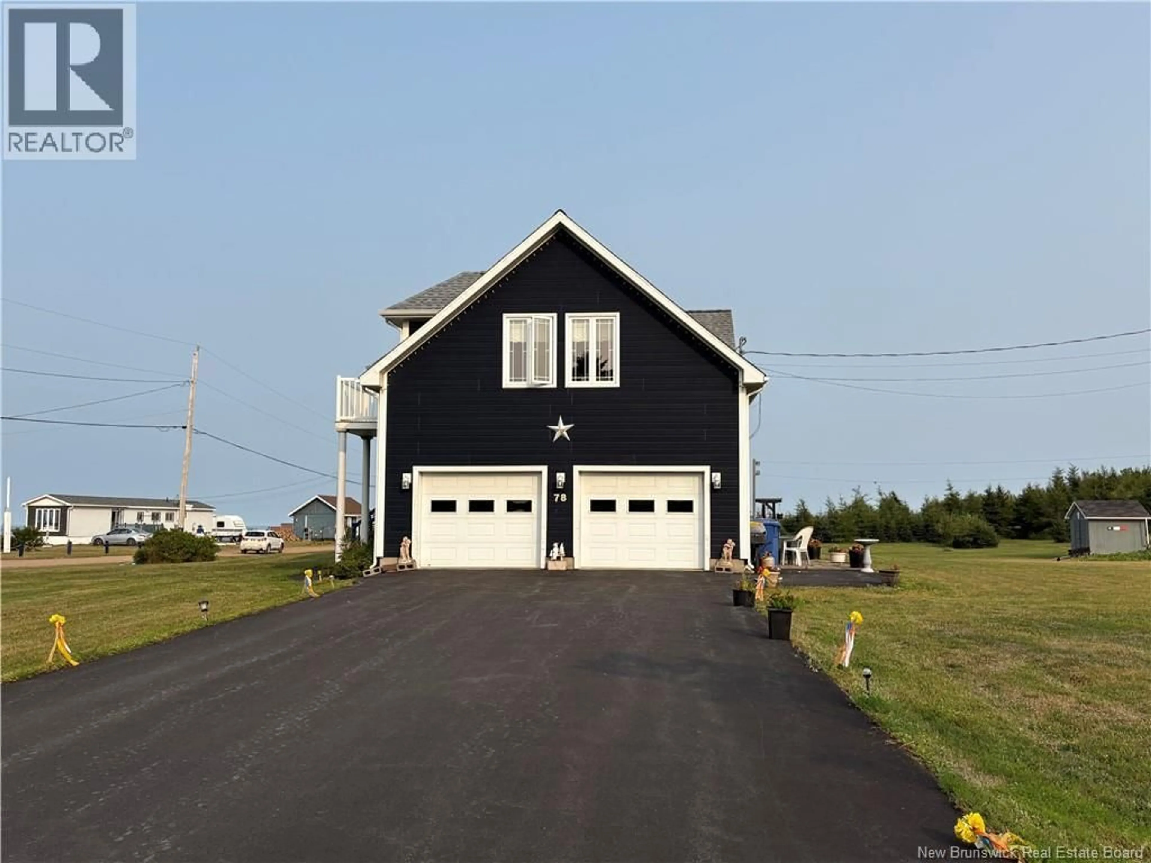 Home with vinyl exterior material, street for 78 RUE DES CHAMPS, Pointe-Verte New Brunswick E8J2V4