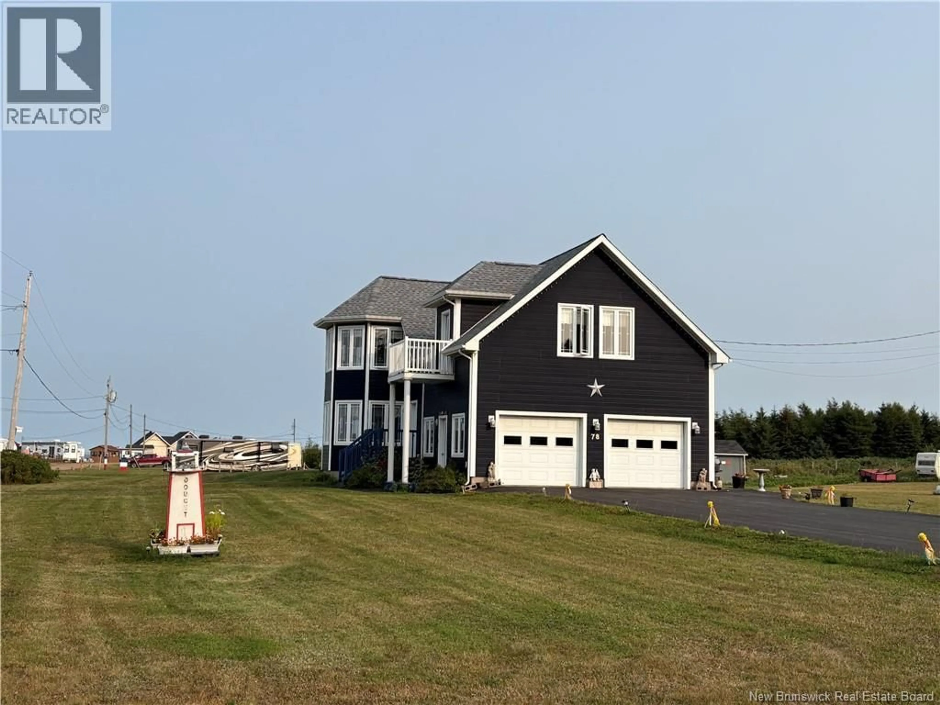 Home with vinyl exterior material, water/lake/river/ocean view for 78 RUE DES CHAMPS, Pointe-Verte New Brunswick E8J2V4