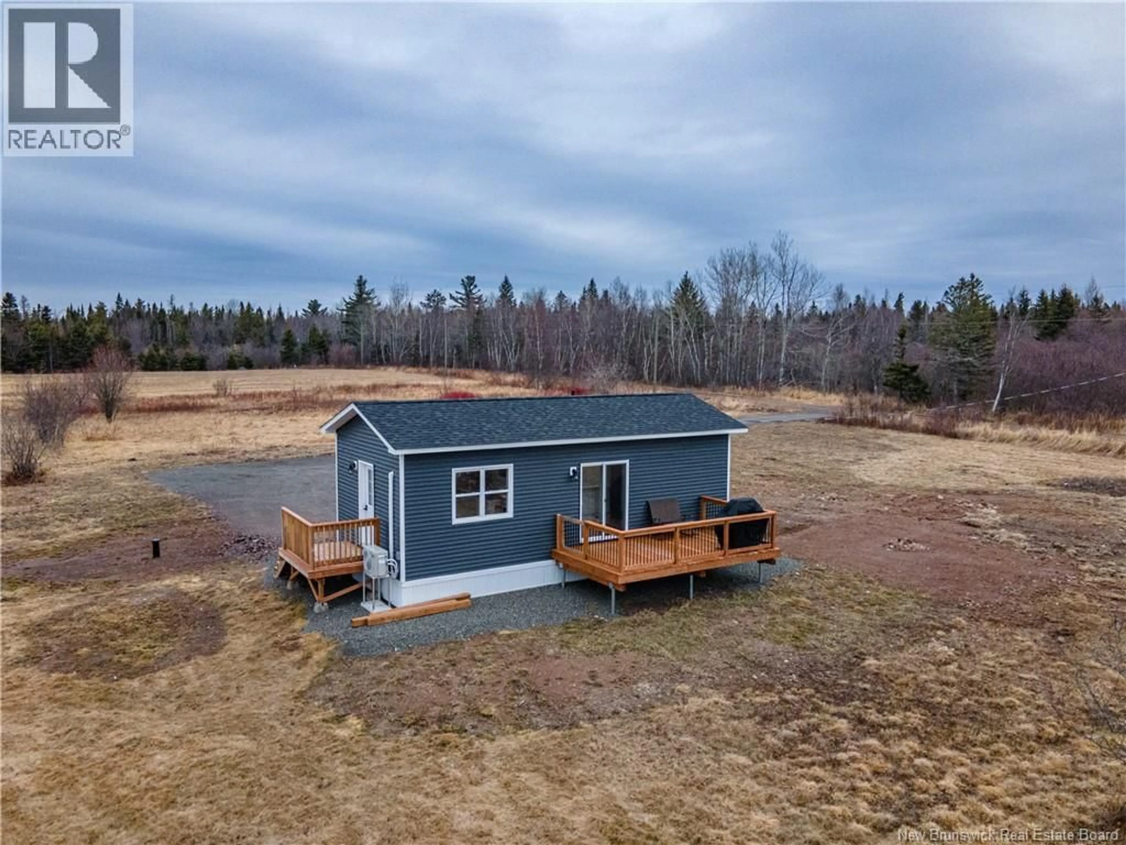 A pic from outside/outdoor area/front of a property/back of a property/a pic from drone, building for 54 GRIFFIN ROAD, Steeves Mountain New Brunswick E1G3Y8