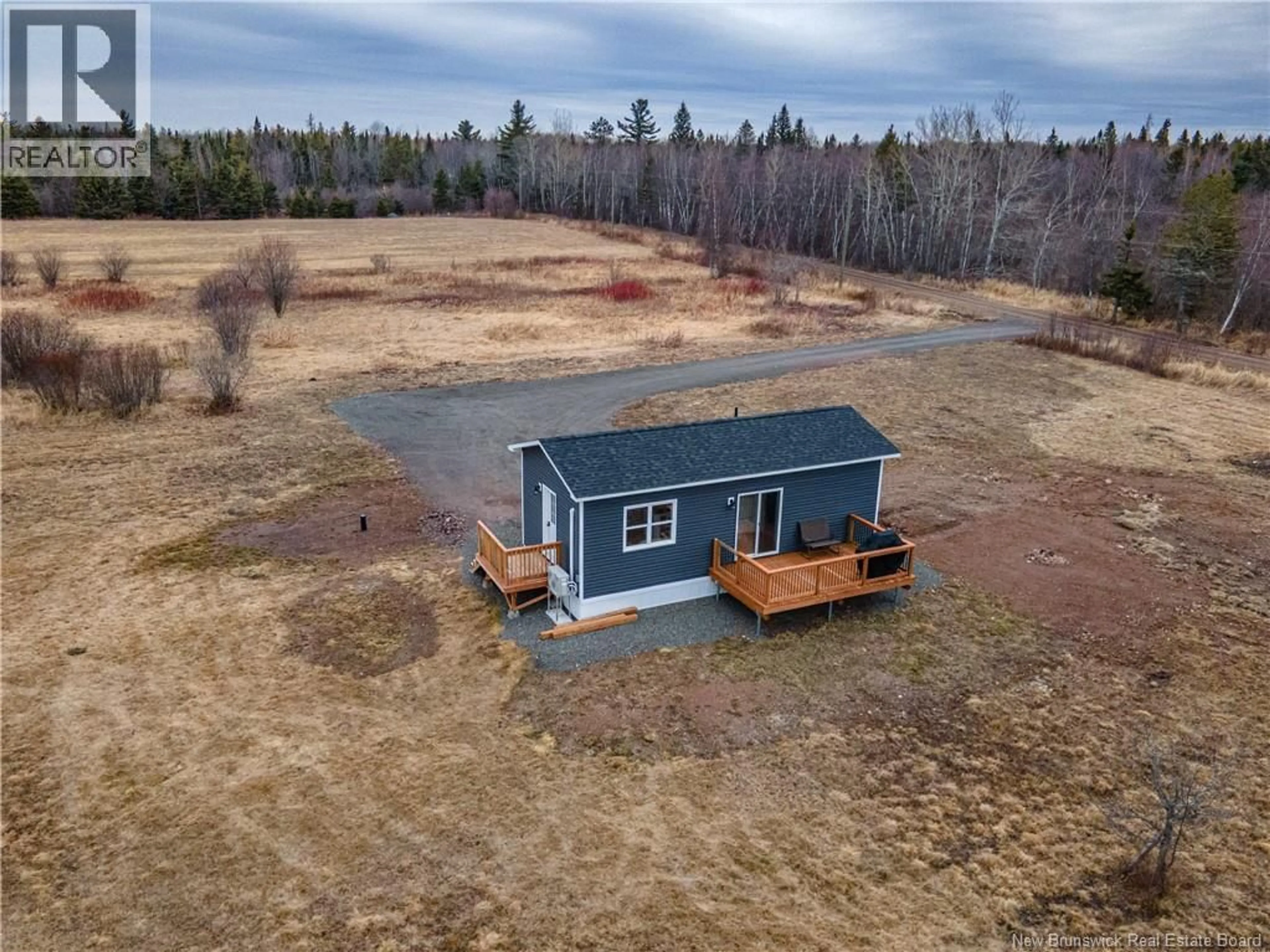 A pic from outside/outdoor area/front of a property/back of a property/a pic from drone, building for 54 GRIFFIN ROAD, Steeves Mountain New Brunswick E1G3Y8
