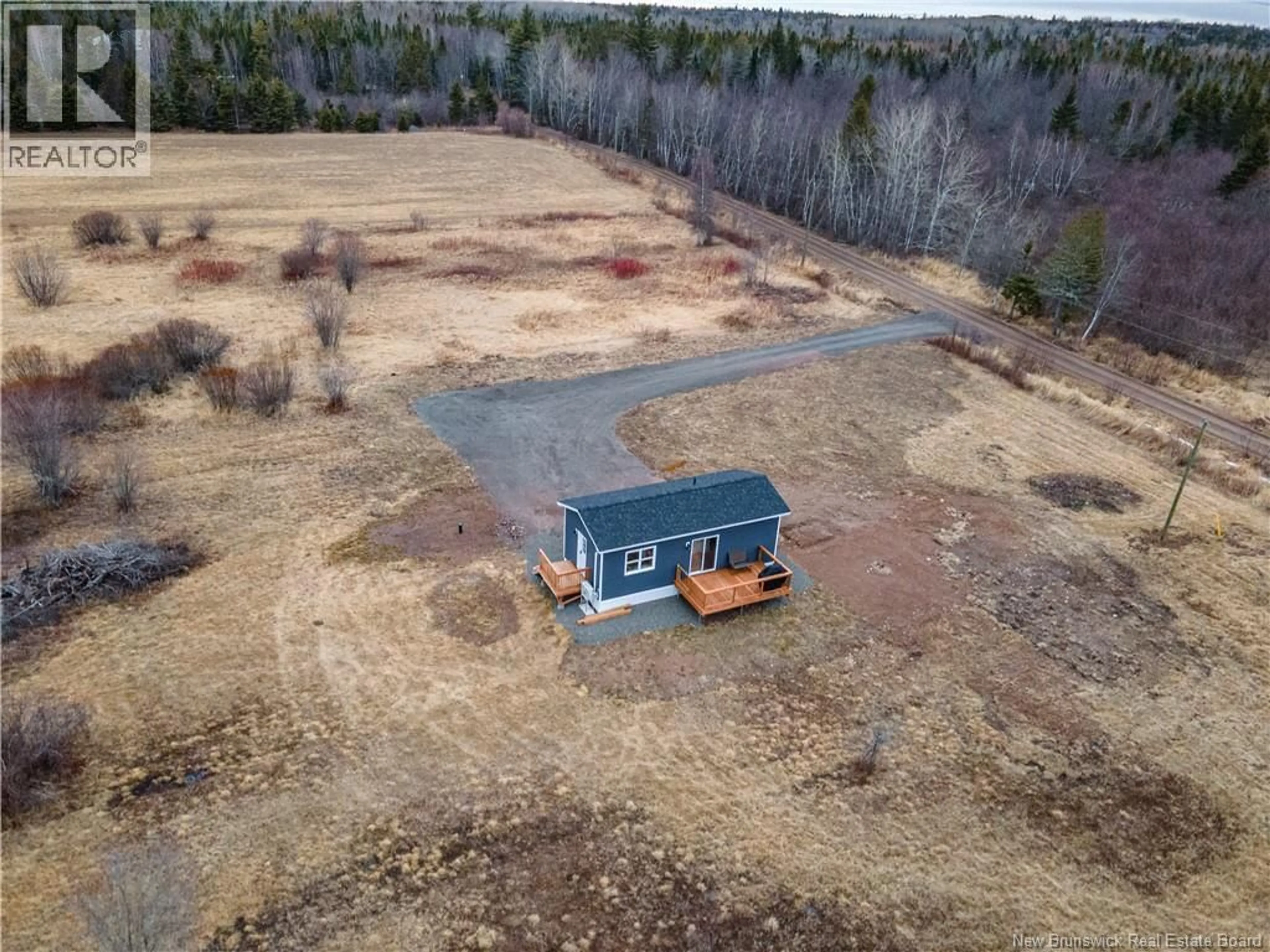 A pic from outside/outdoor area/front of a property/back of a property/a pic from drone, building for 54 GRIFFIN ROAD, Steeves Mountain New Brunswick E1G3Y8