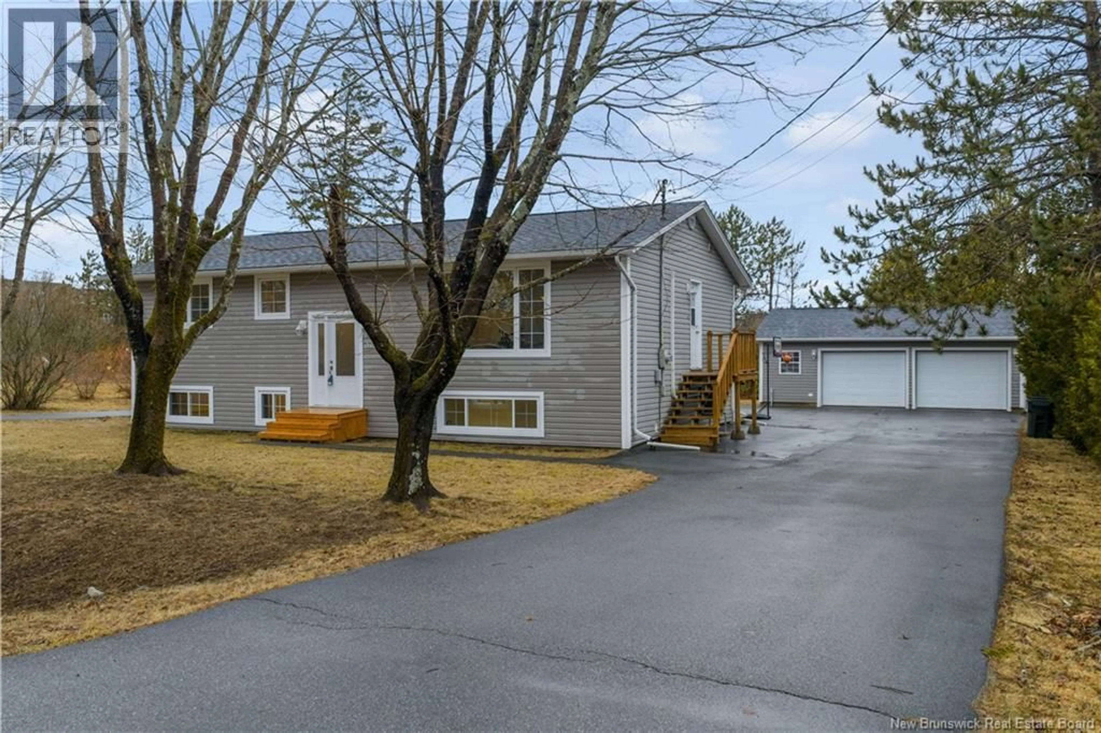 A pic from outside/outdoor area/front of a property/back of a property/a pic from drone, street for 37 MILLICAN DRIVE, Quispamsis New Brunswick E2E4V4