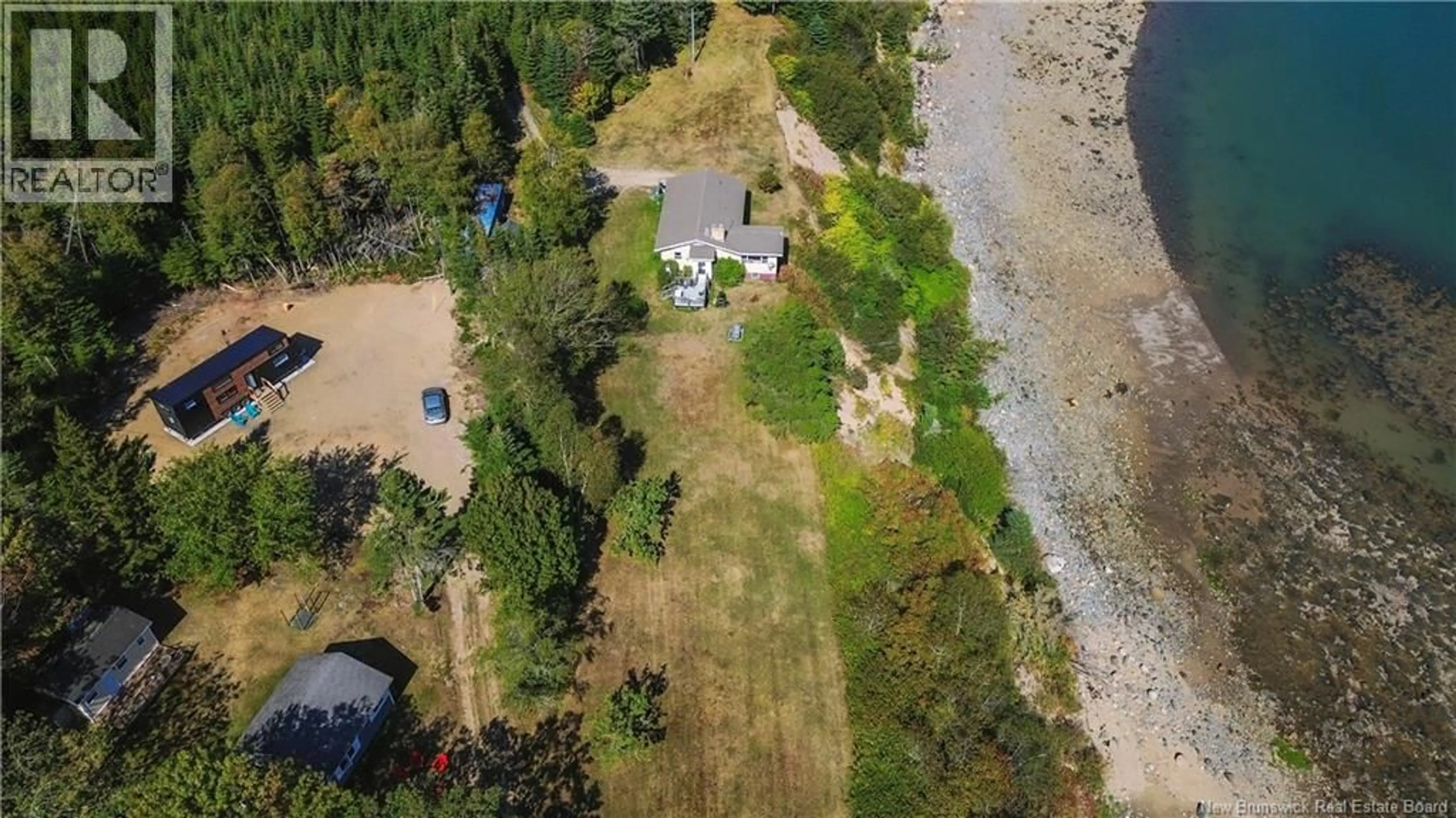 A pic from outside/outdoor area/front of a property/back of a property/a pic from drone, unknown for 20 DICKSON LANE, New River Beach New Brunswick E5J1H5
