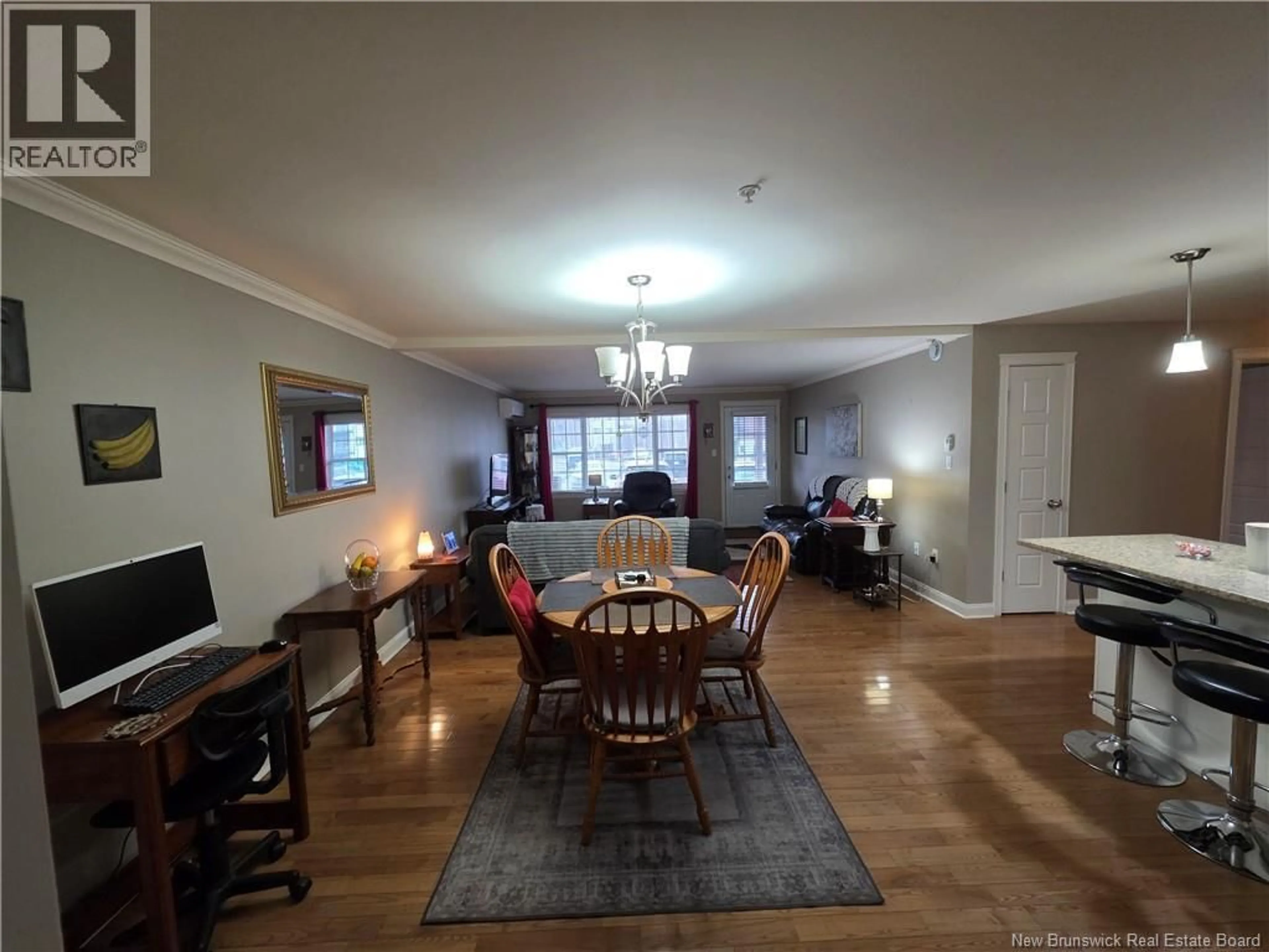 Dining room, wood/laminate floor for 103 - 65 BRAYSON BOULEVARD, Oromocto New Brunswick E2V0J2