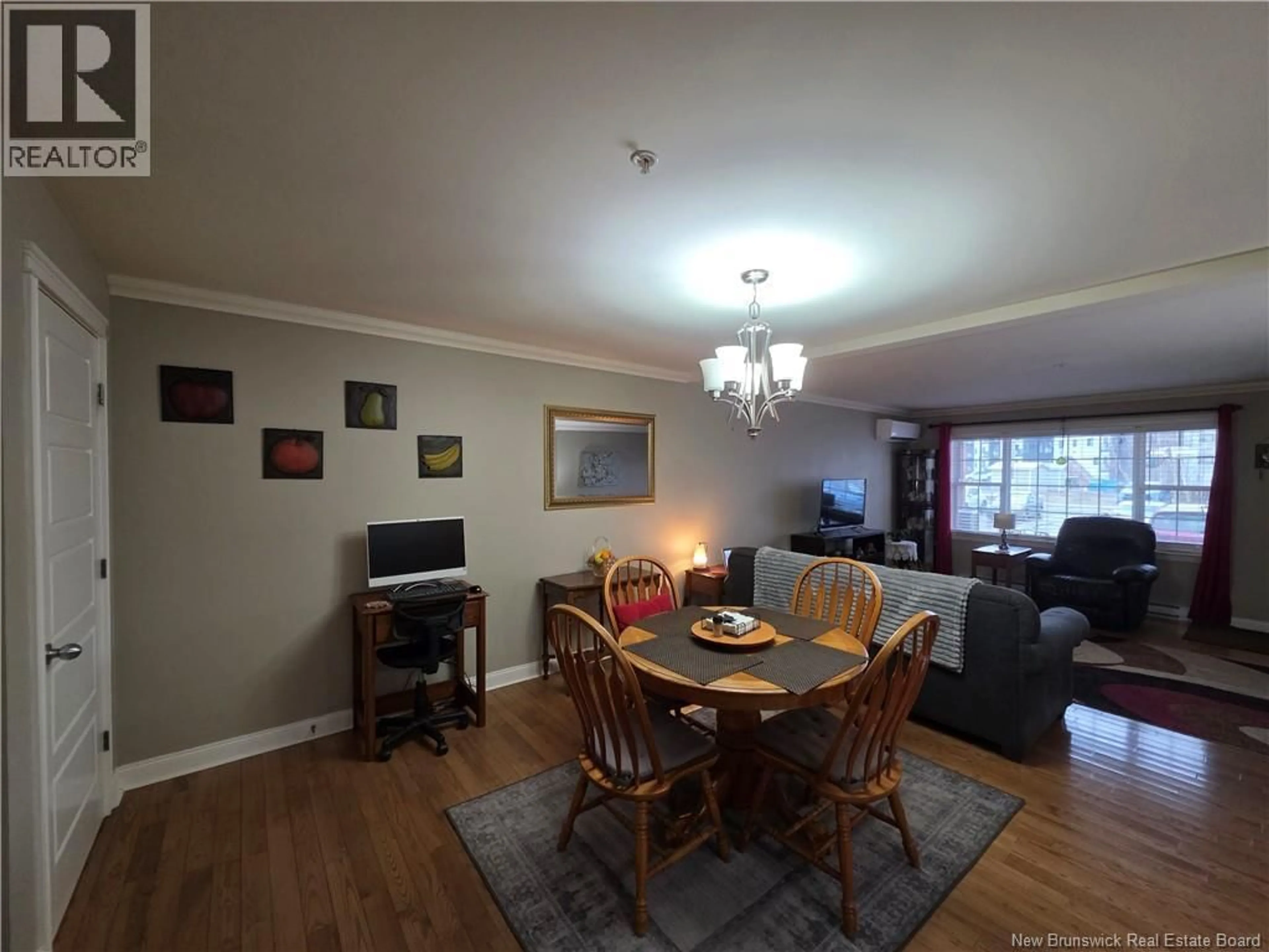 Dining room, wood/laminate floor for 103 - 65 BRAYSON BOULEVARD, Oromocto New Brunswick E2V0J2