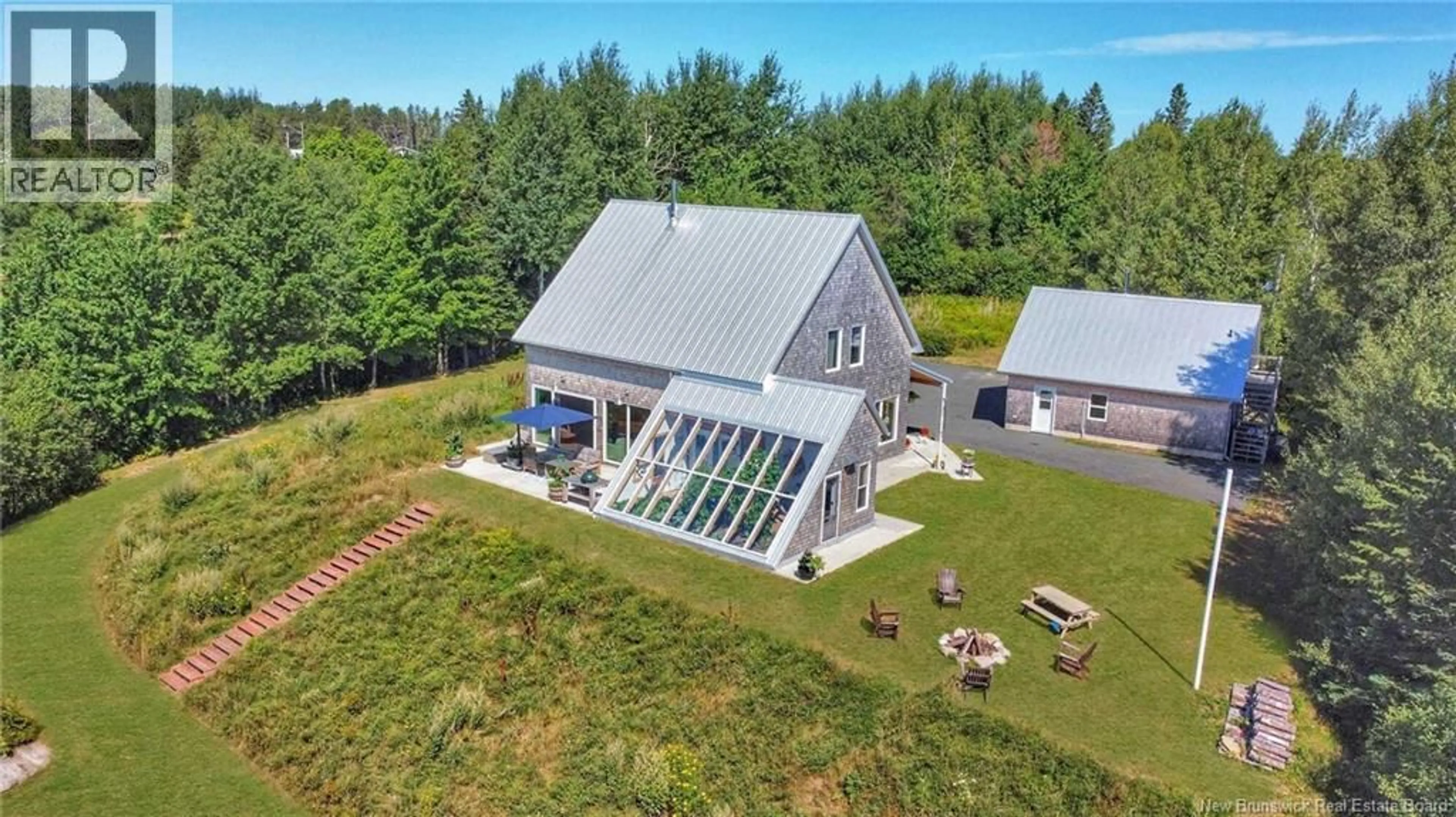 A pic from outside/outdoor area/front of a property/back of a property/a pic from drone, unknown for 1059 NB 365, Gauvreau New Brunswick E1X2P5