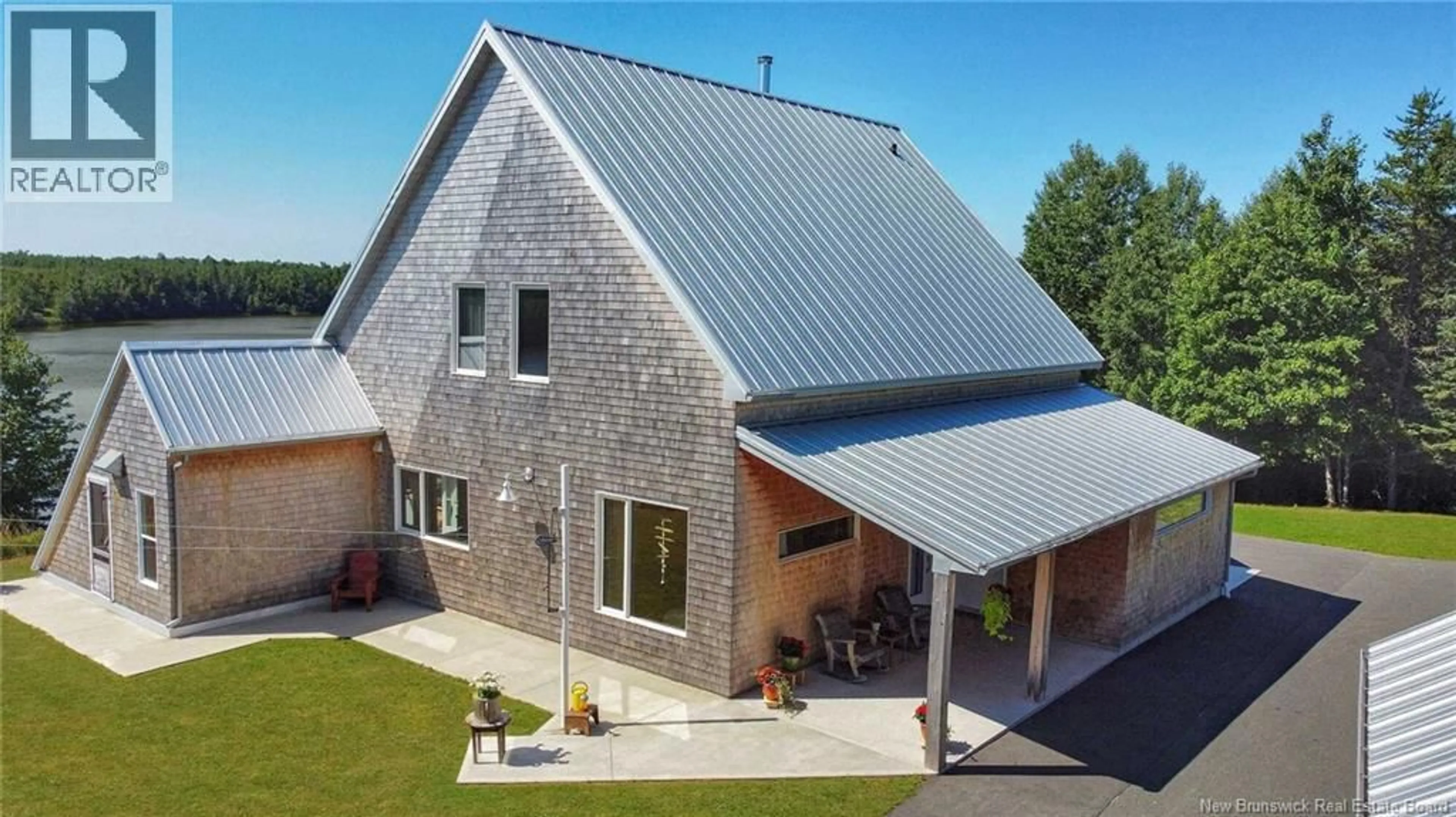 A pic from outside/outdoor area/front of a property/back of a property/a pic from drone, building for 1059 NB 365, Gauvreau New Brunswick E1X2P5