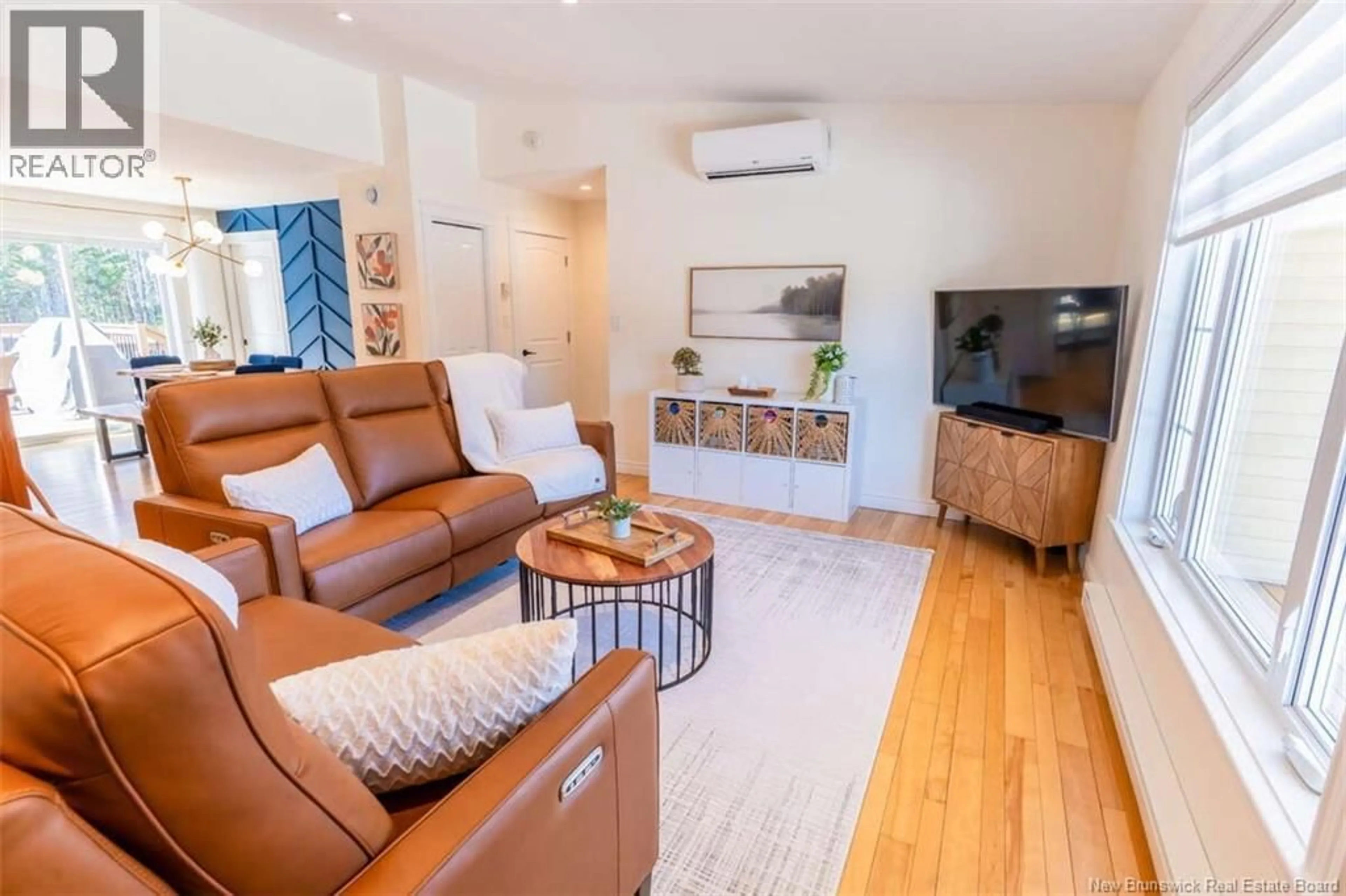 Living room with furniture, wood/laminate floor for 119 PETERS DRIVE, Fredericton New Brunswick E3G0G7